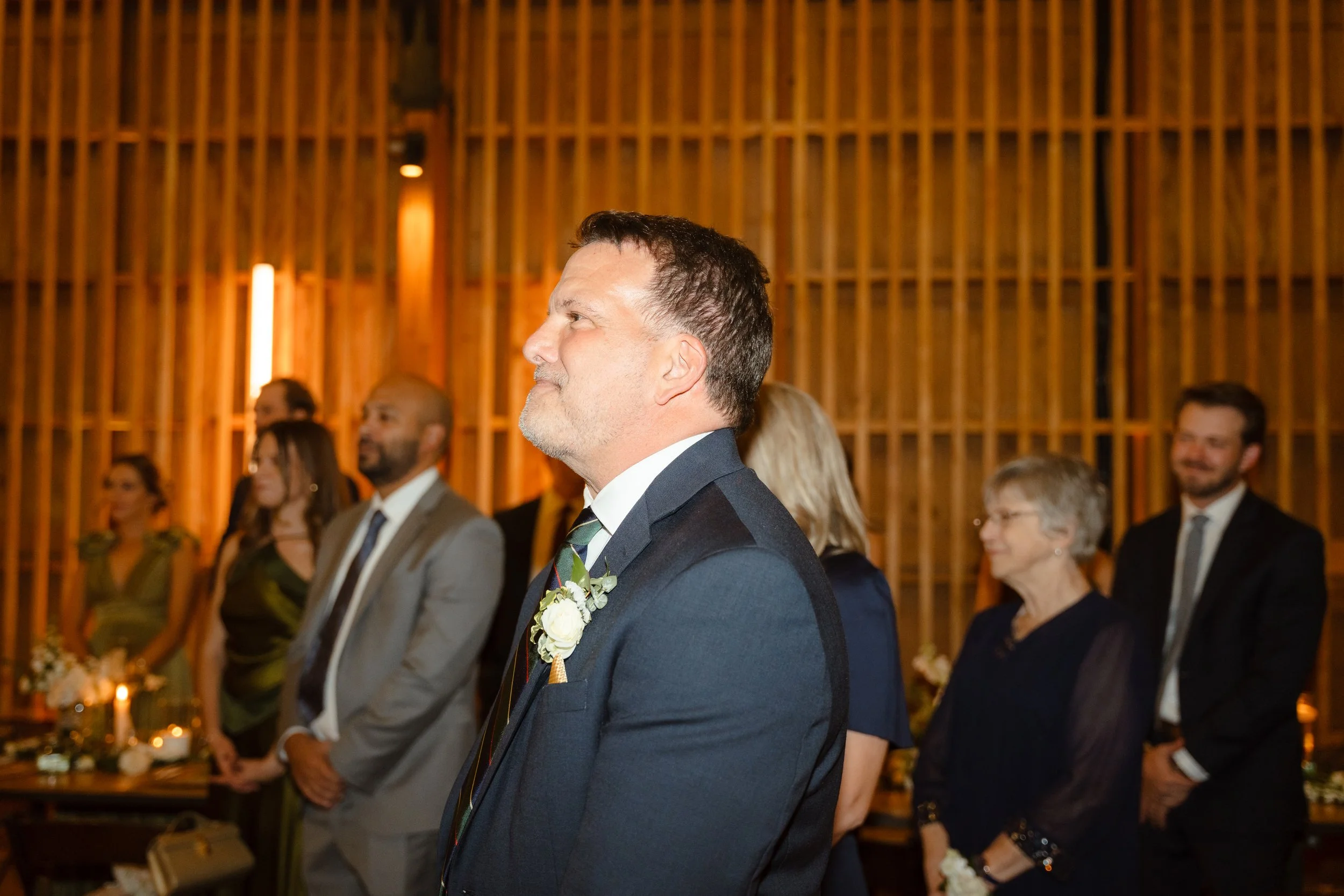 father watching daughters first dance