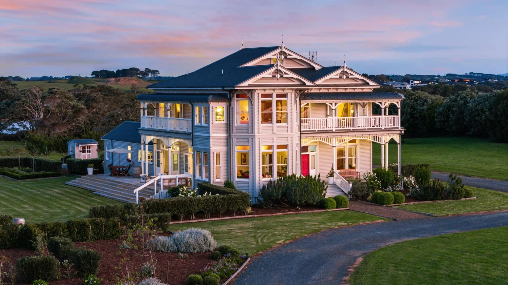 Restored early-1900s two-storey villa at 111 Wharf Road, featuring custom traditional timber windows and doors by Dando Doors and Windows.