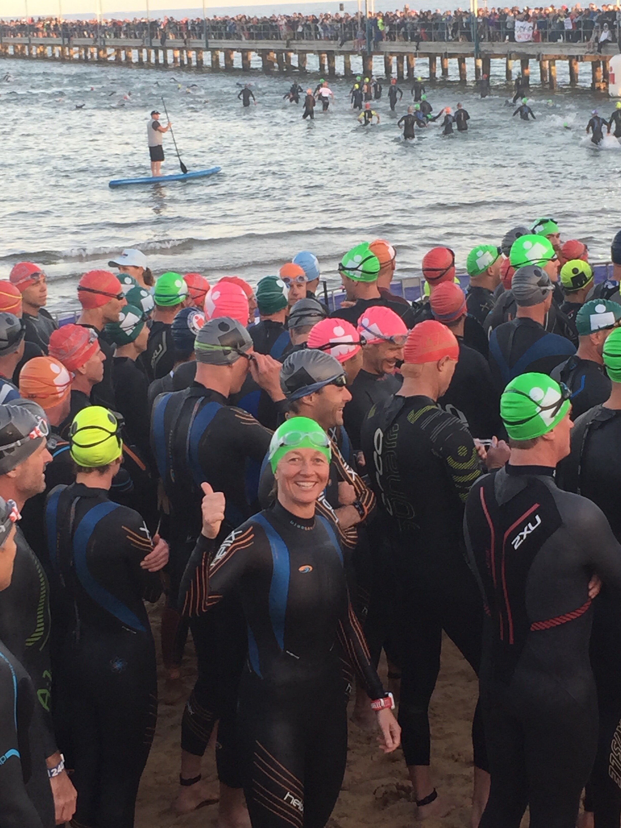 About to roll over the IRONMAN Melbourne start line with a massive crowd lining the Frankston Pier.jpg