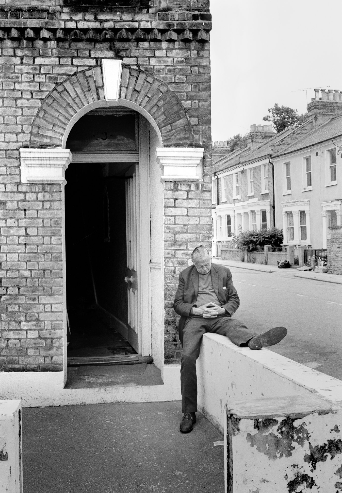 LONDON MAN ASLEEP DOORE.jpg