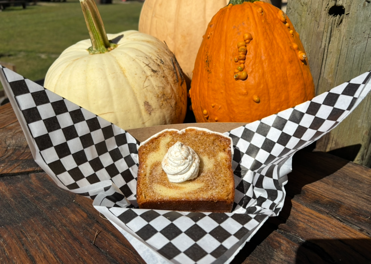 Iced Pumpkin Swirl Loaf Cake, topped with a pumpkin drizzle and whipped cream $5