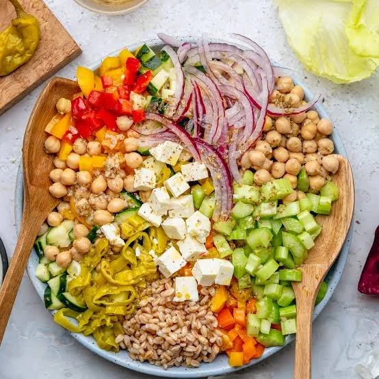 A colorful, nutrient-dense meal featuring fresh vegetables and proteins to support holistic menopause management.
