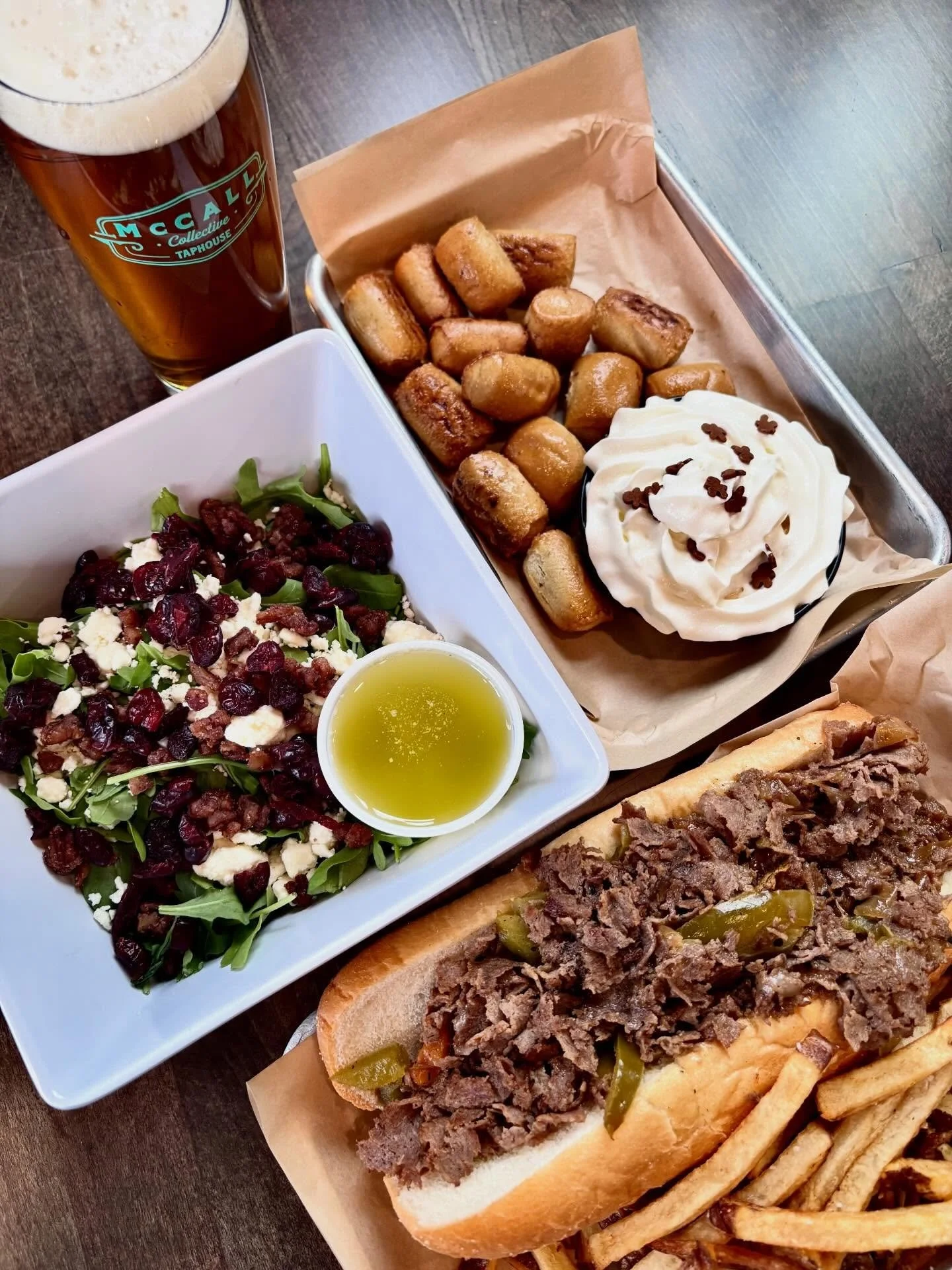 December food specials at the Taphouse are 🔥 

Cheesesteak - sweet red &amp; green peppers, saut&eacute;ed onion, smoked cheddar blend with chipped ribeye steak on a roll

Salad - Arugula, feta, orange craisins, candied pecans, orange thyme vinaigre