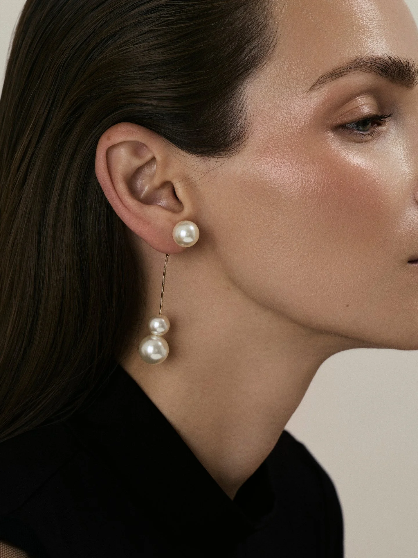 Quiet elegance, captured with intention.

This image is about restraint and precision: soft light on skin, clean lines, and jewelry that speaks through detail rather than volume. At Couture Consultancy, this is exactly where our work begins &mdash; t