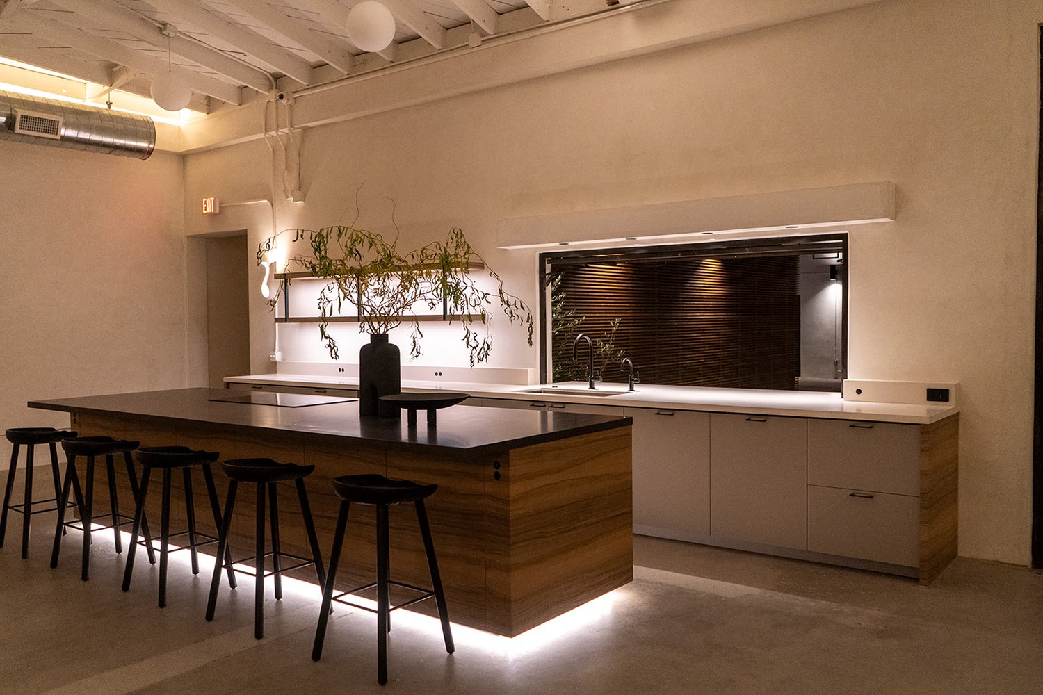 Lacuna kitchen island and bar stools evening lighting Los Angeles