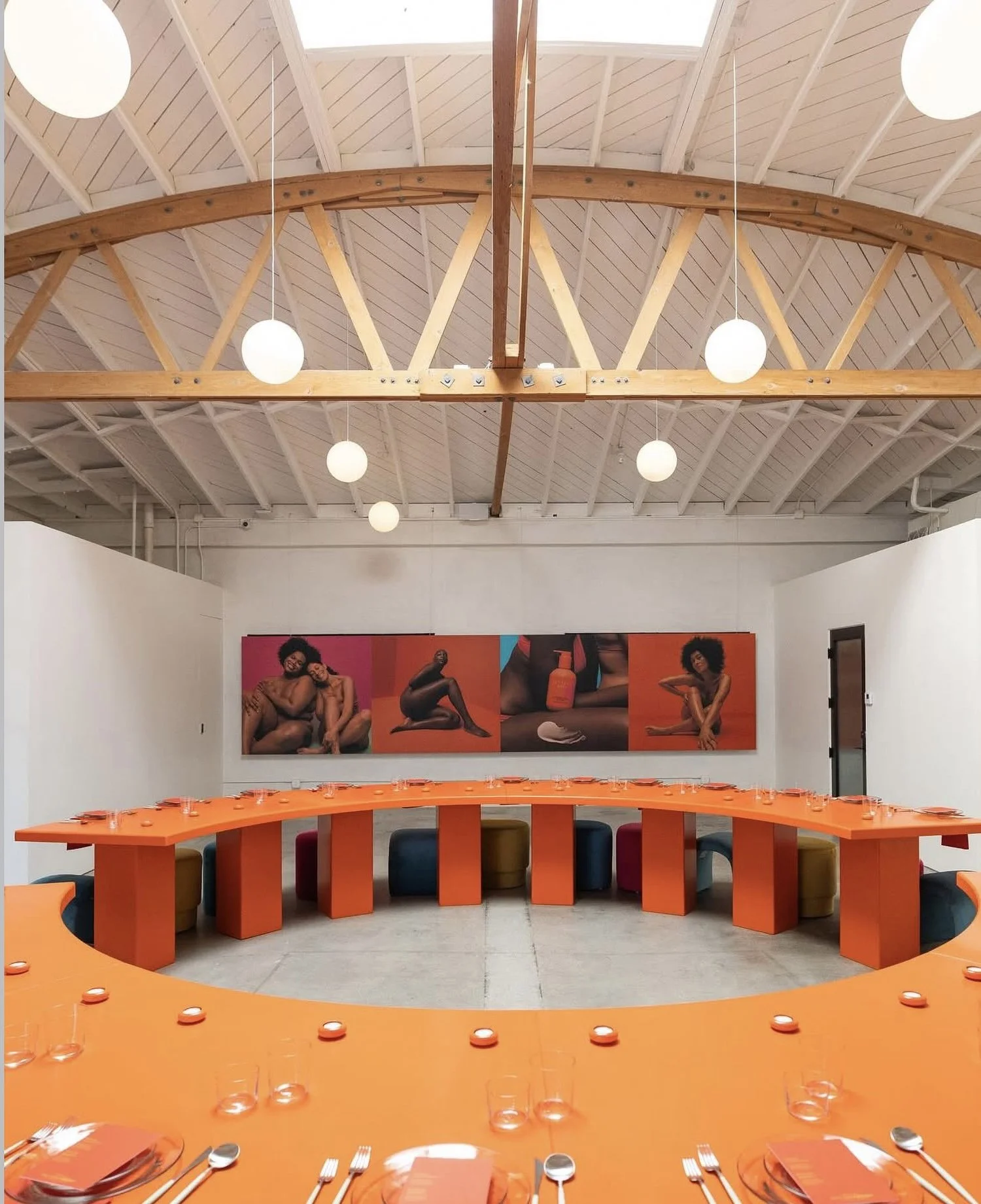 Lacuna colorful brand event with orange seating indoor West Adams Los Angeles