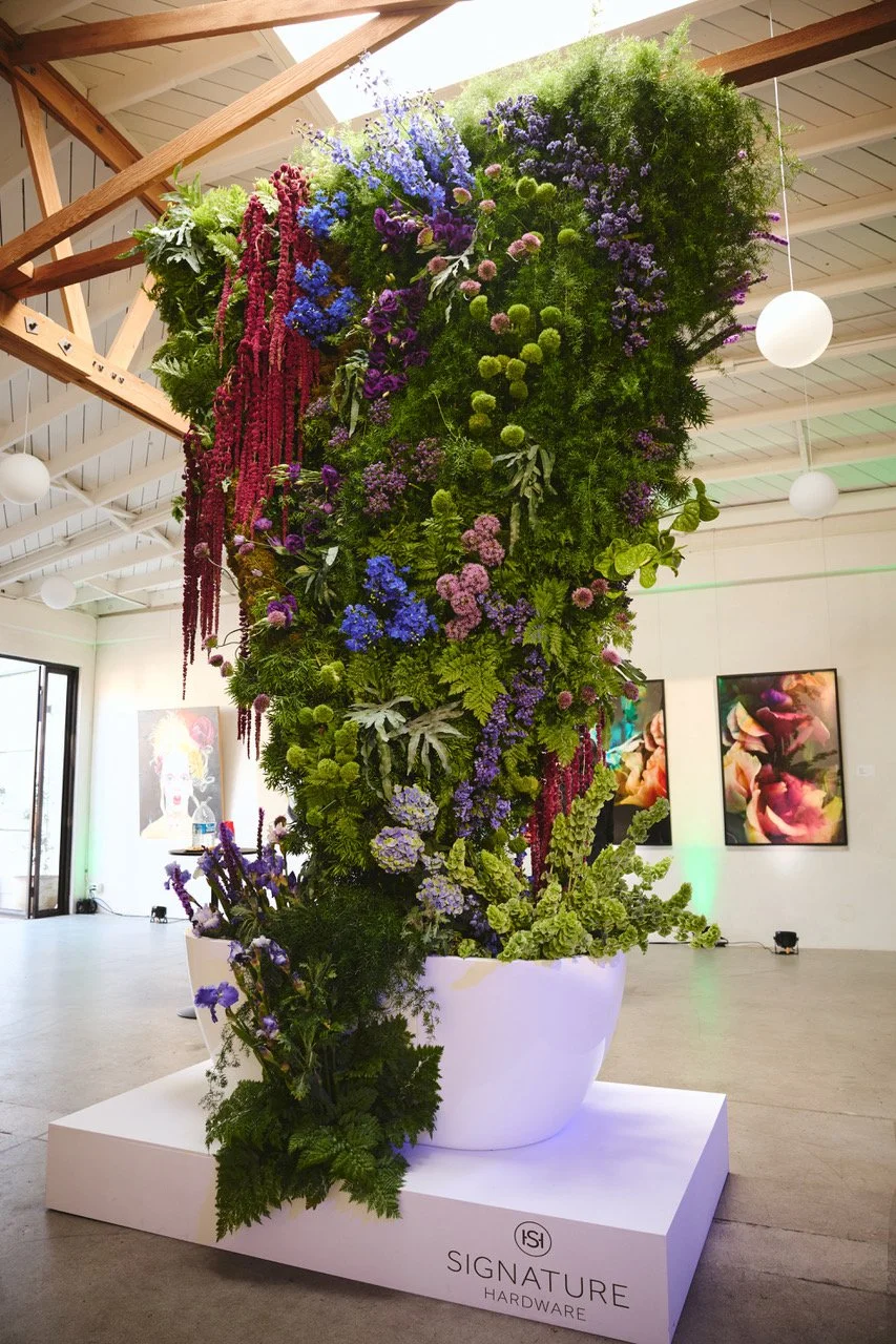 12 foot floral sculpture by Rogue and Fox displayed in a white tub from Signature Hardware at Lacunafest Lacuna Space Los Angeles