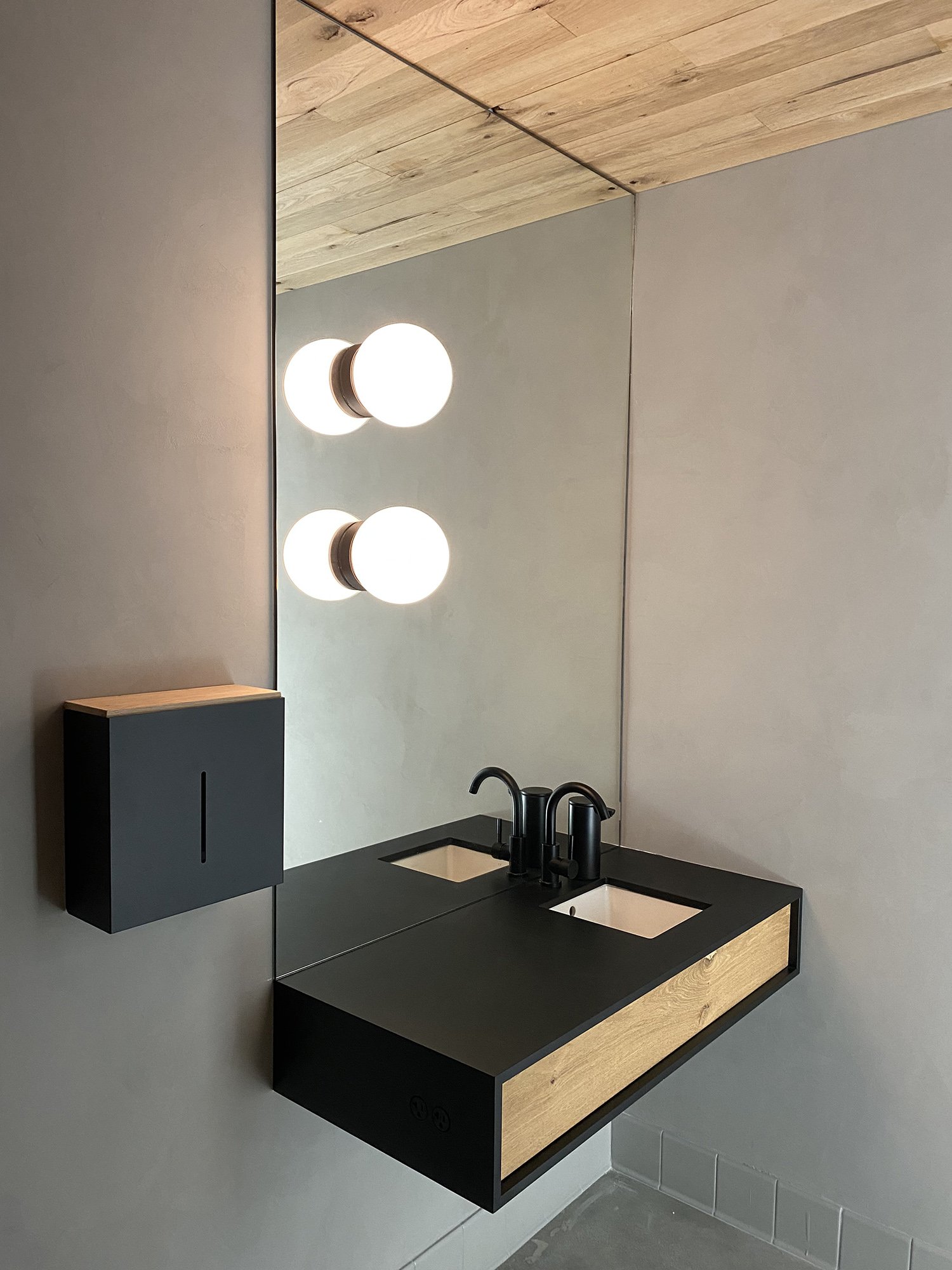 Lacuna bathroom sink with globe vanity light fixtures West Adams
