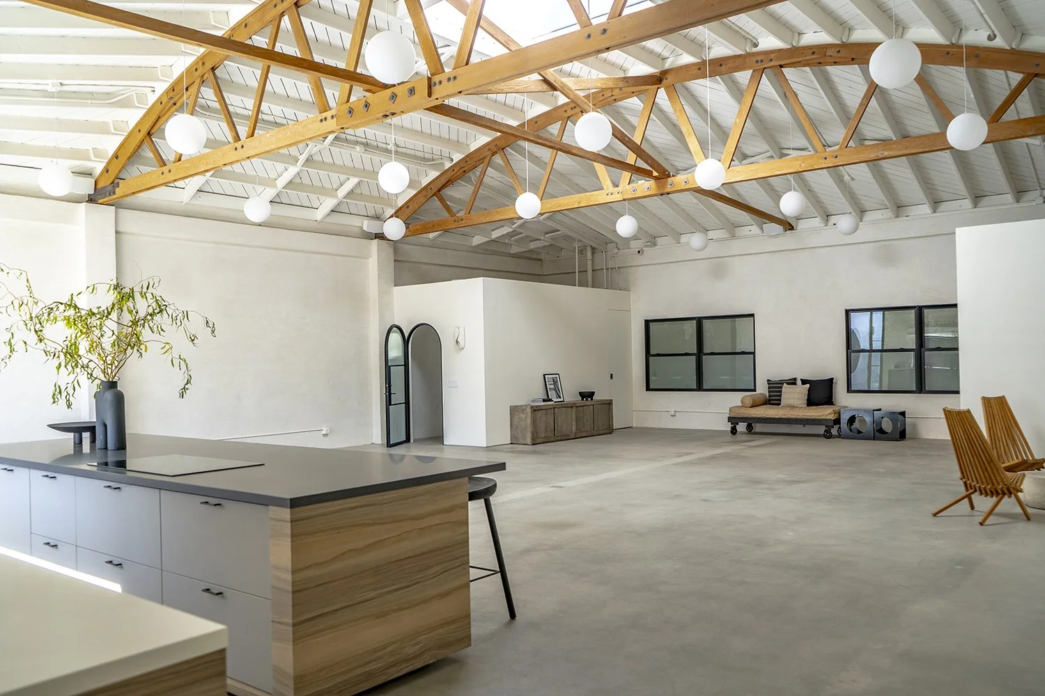 Lacuna indoor event space with 18 foot bow truss ceiling wide angle Los Angeles