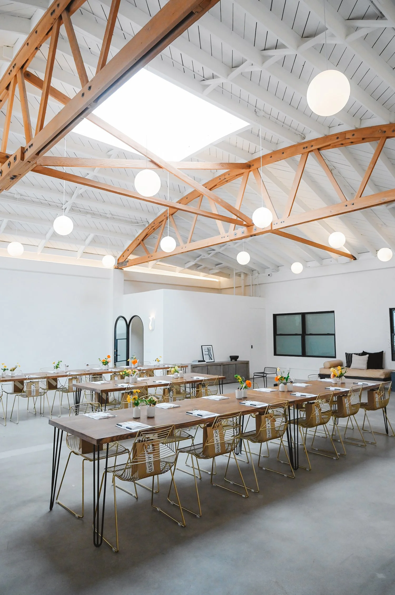 Lacuna Allswell writing workshop long table event bow truss ceiling Los Angeles