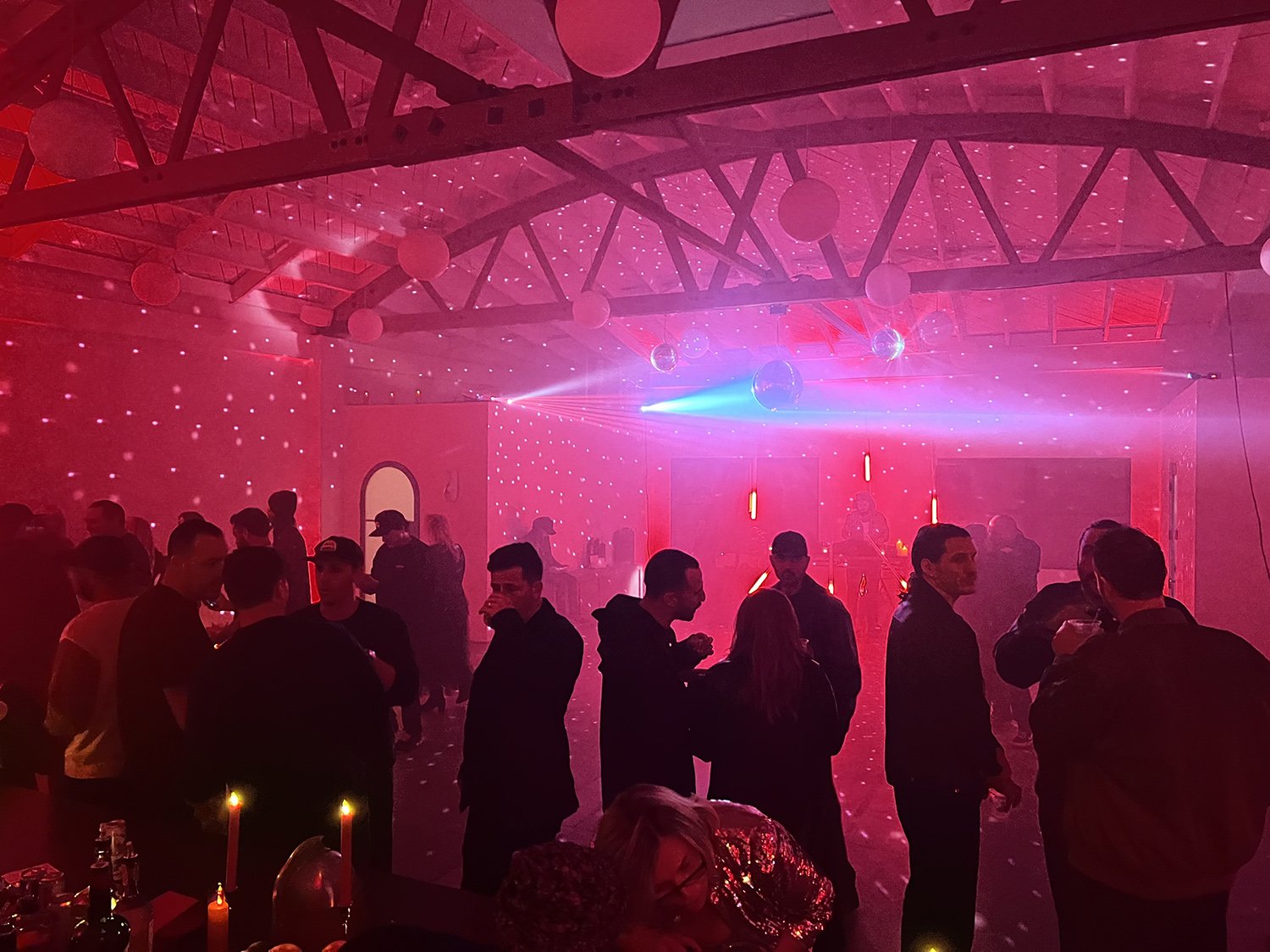 Lacuna Scorpio party red lighting crowd indoor West Adams Los Angeles