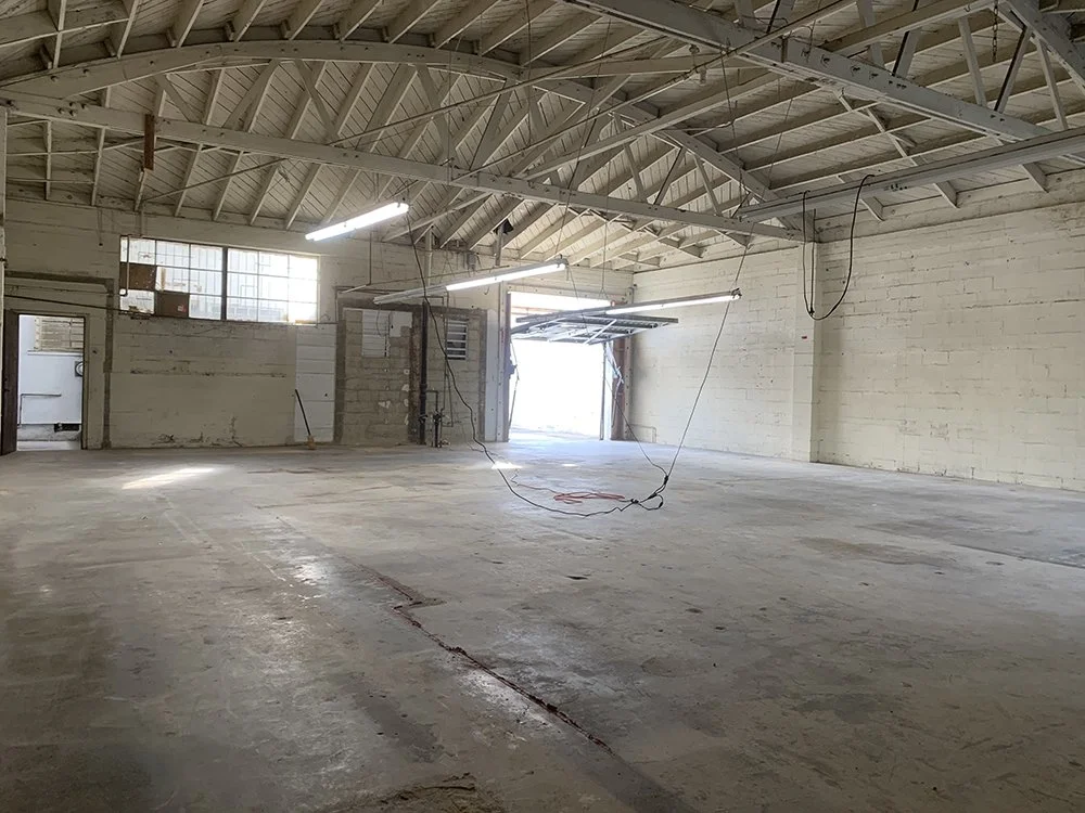 Empty warehouse interior of what would become Lacuna Space in West Adams Los Angeles before renovations began