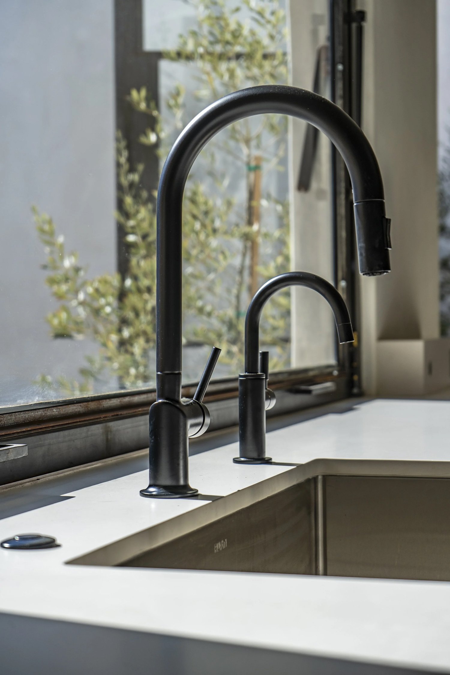 Lacuna kitchen with Ferguson black faucet and sink fixtures West Adams Los Angeles