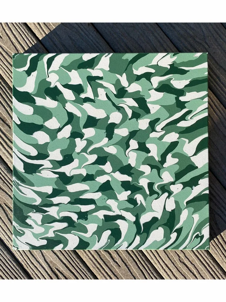 Green fluid acrylic painting with camouflage-like organic movement, layered abstract textures, and earthy modern aesthetics