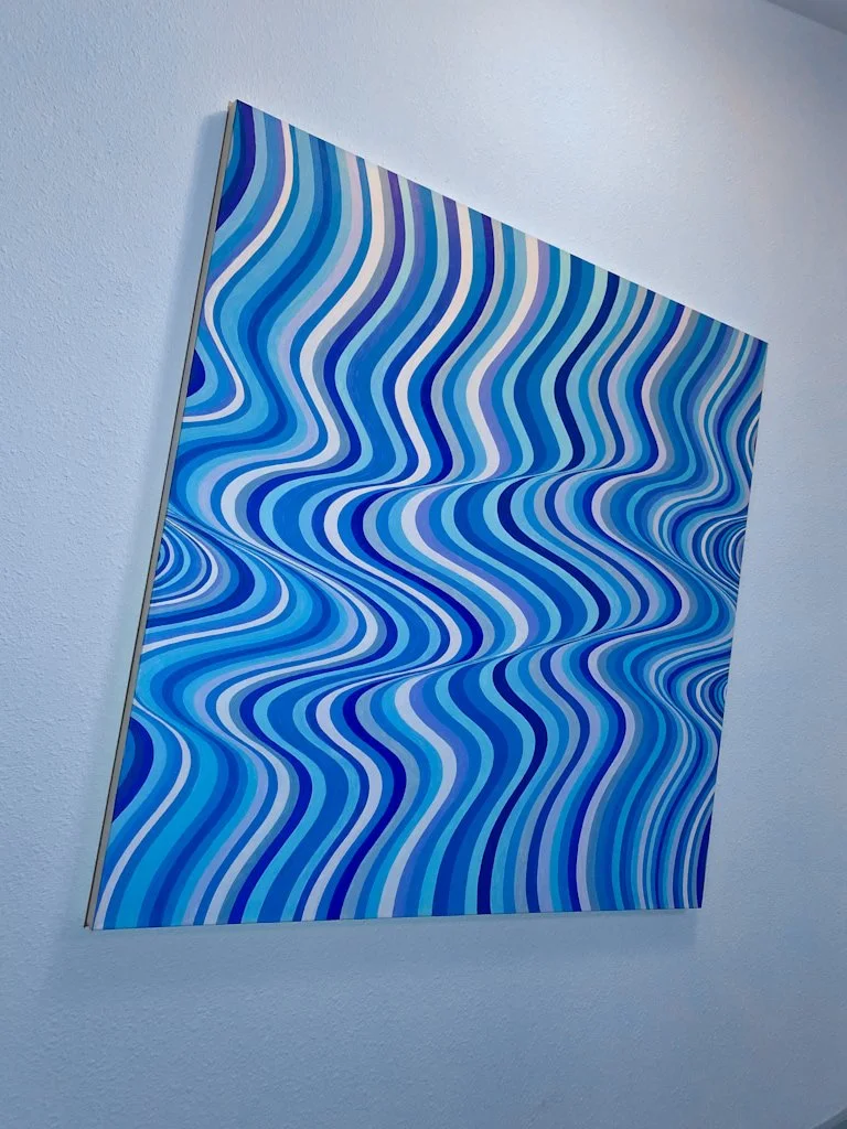 Blue wave-pattern acrylic painting with flowing striped movement, calming optical illusion effects, and modern minimalist aesthetics