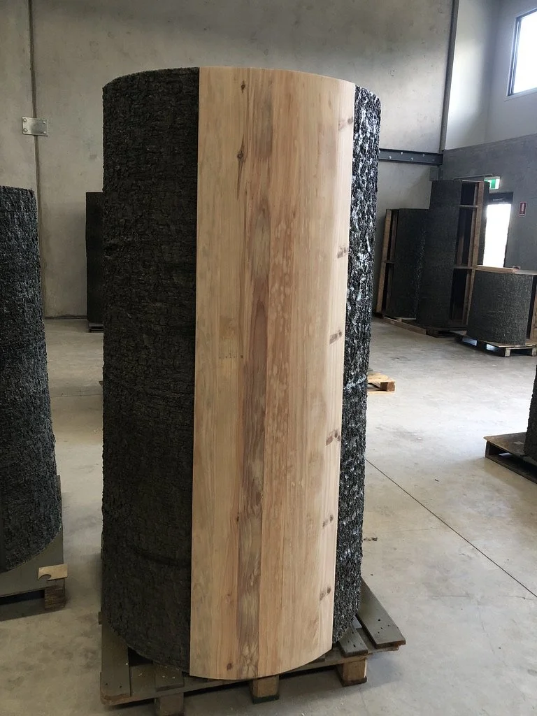 Coopered bunya pine panel alongside cast urethane tree forms, part of the Bunya Infinity Forest installation for the National Museum of Australia, by Ross Annels