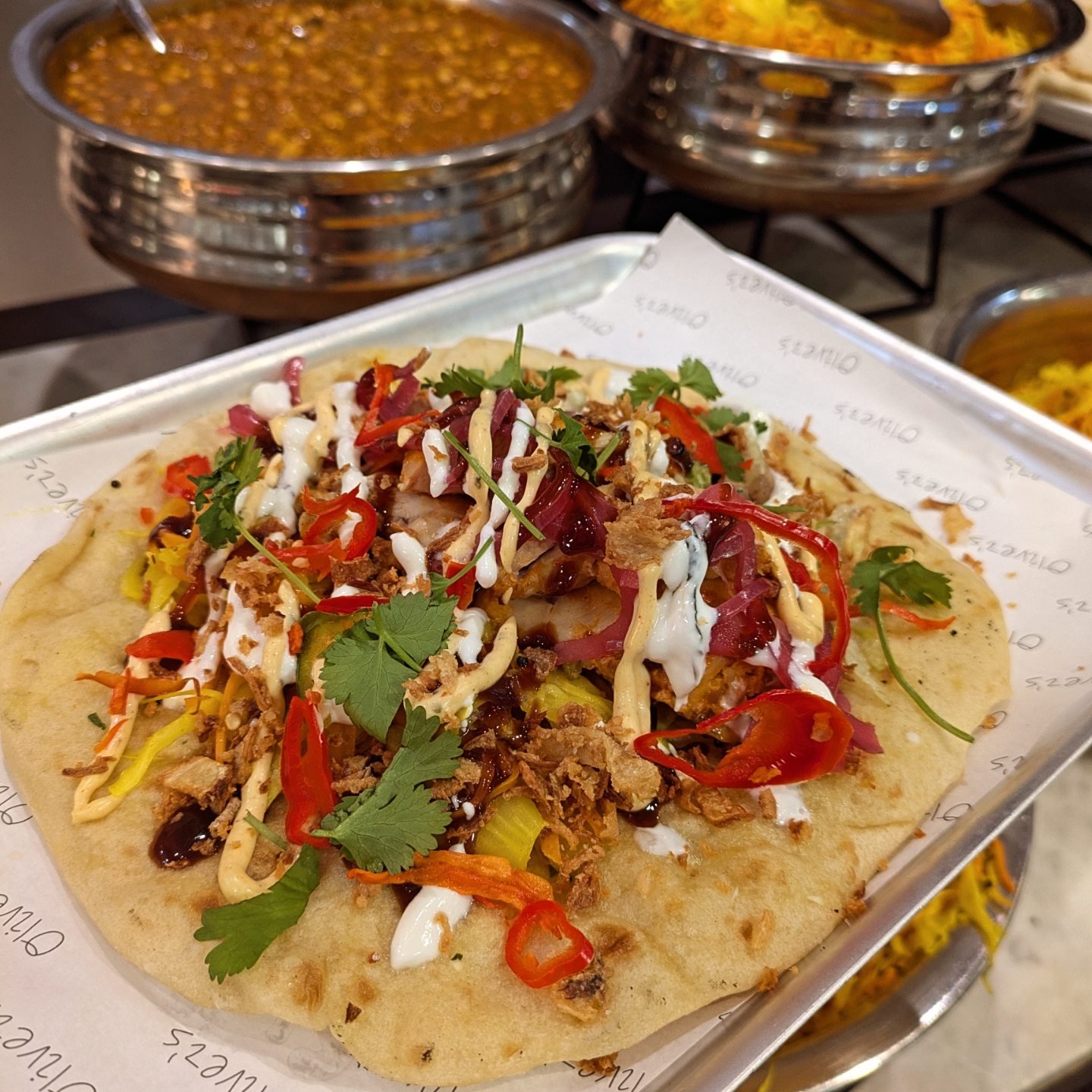 The team is ready to fire some dirty naans! 🫚🌶️🔥🧄