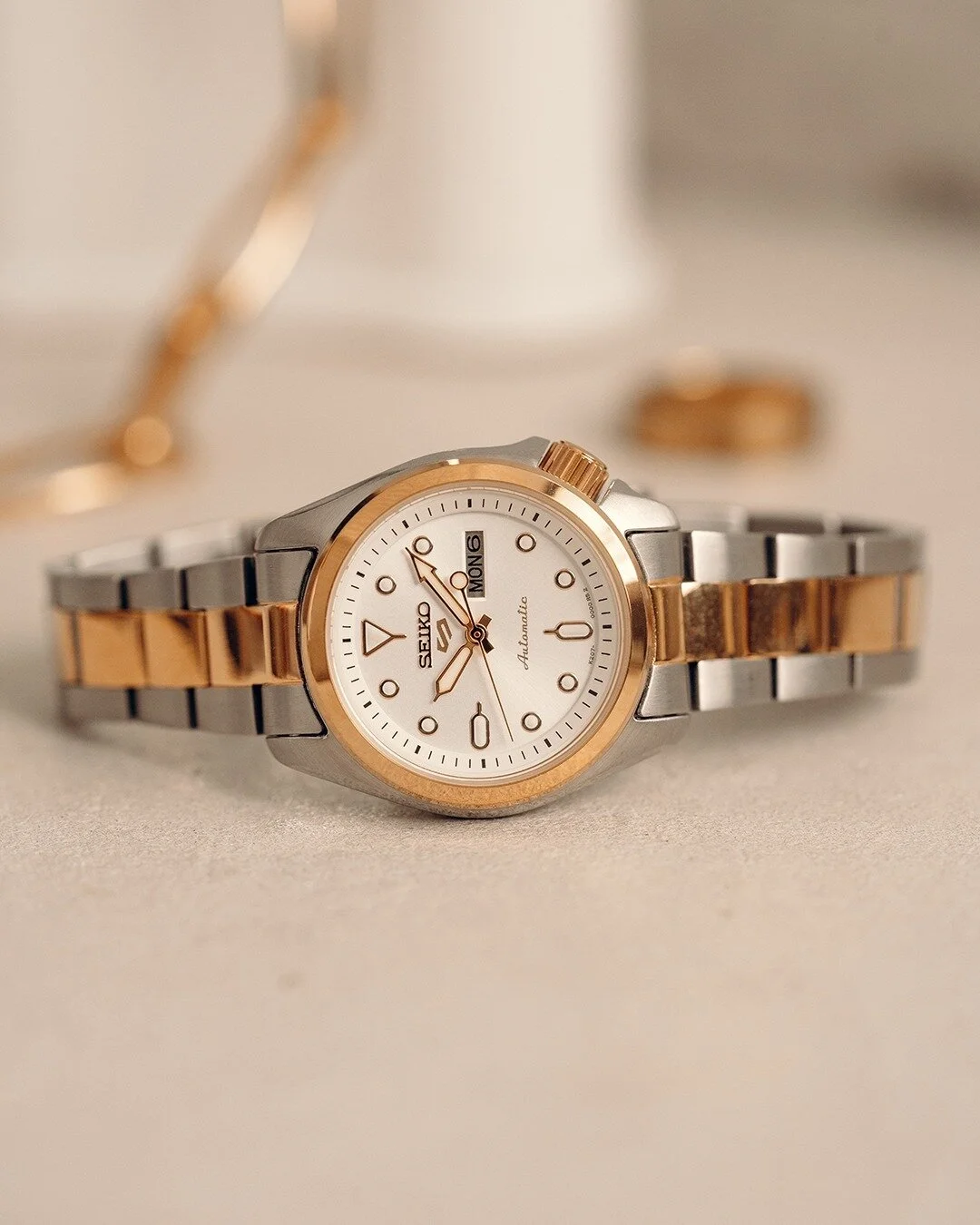 SRE004 displays a vintage, street-smart style in a new smaller case. Its bracelet with a two-tone finish makes this accessory versatile for day-to-day wear and the perfect gift. 

#Seiko5Sports #ShowYourStyle