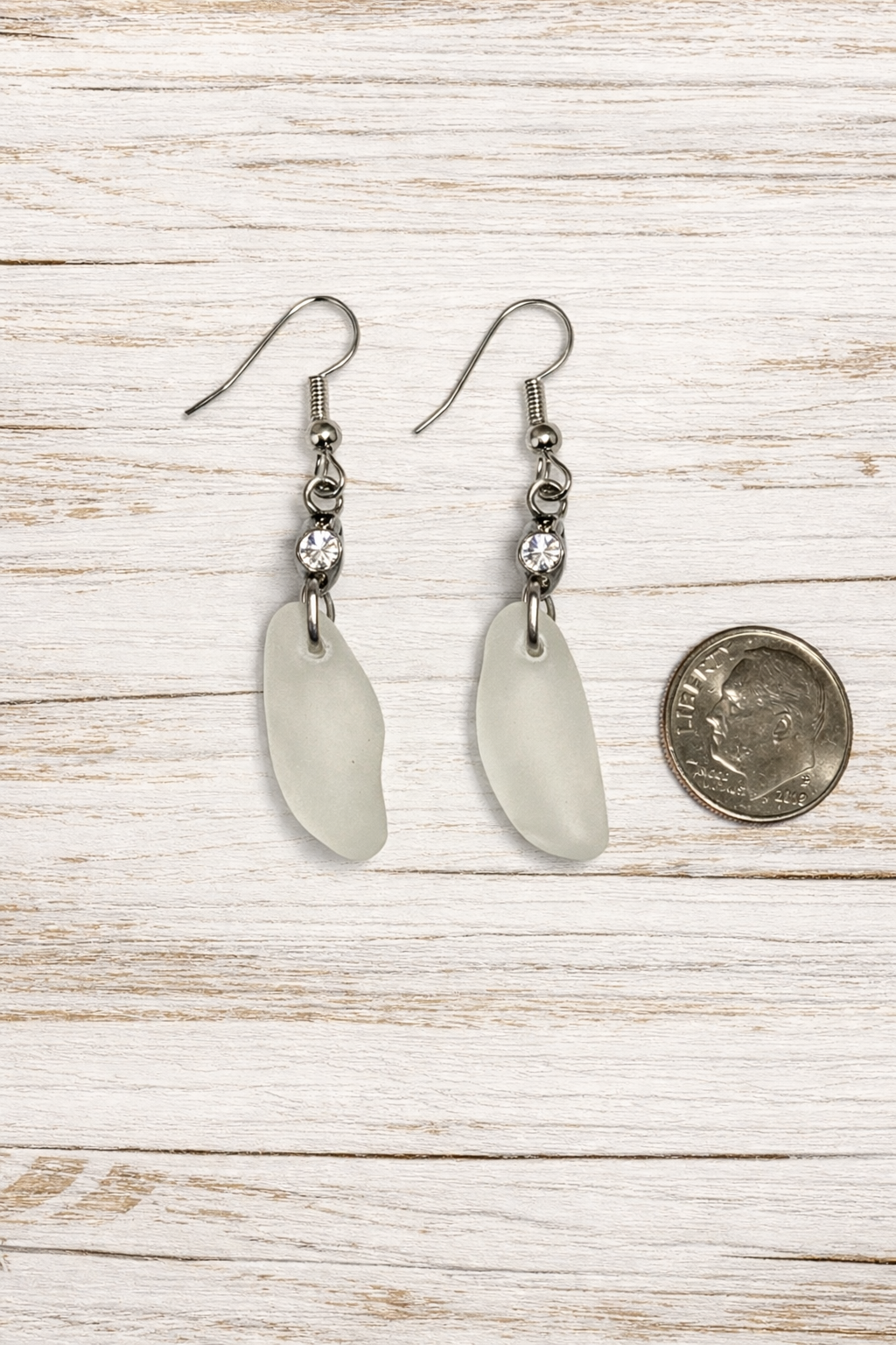 white frosted earrings with dime.png