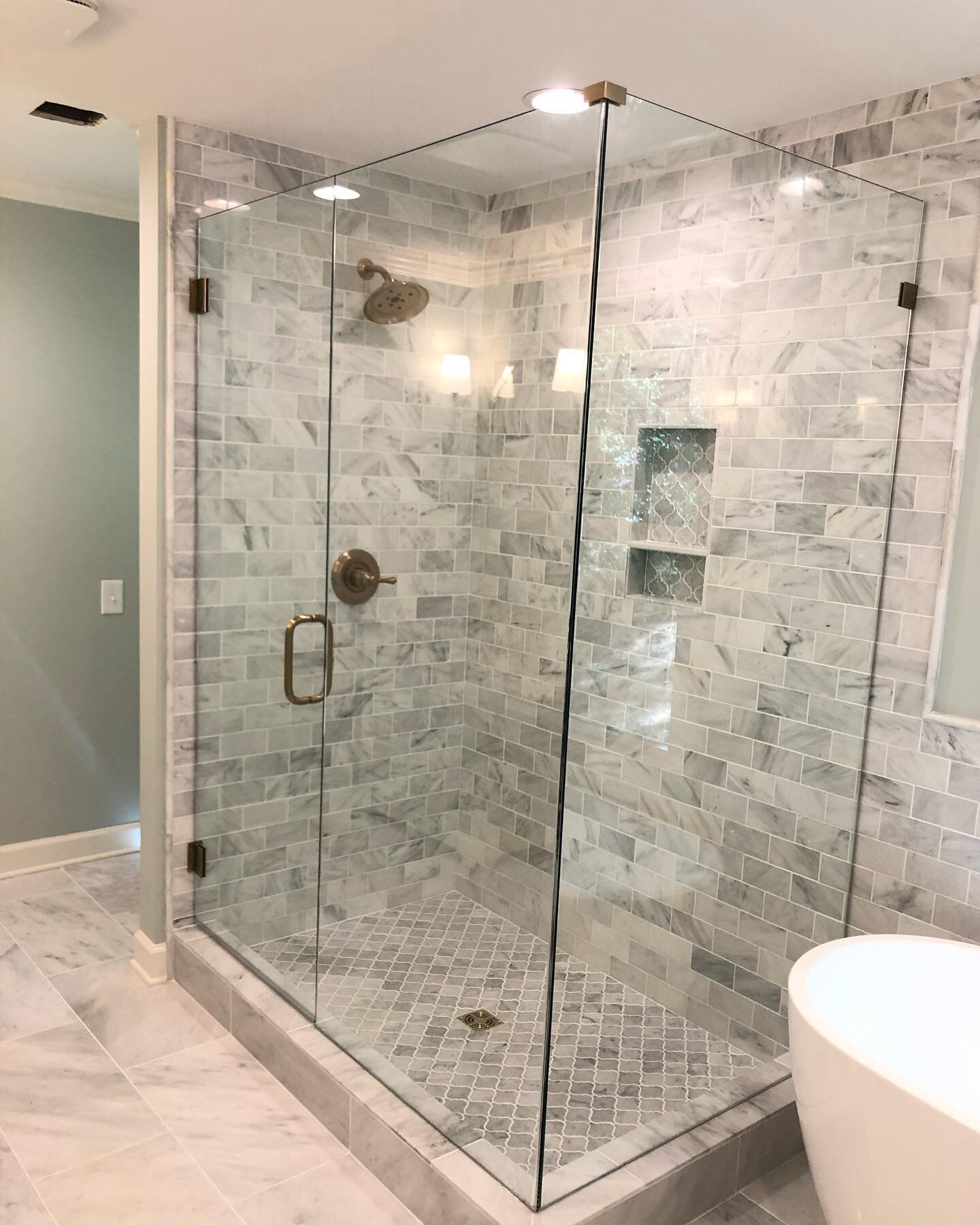 Before and After - - more to come on this beautiful marble clad bathroom transformation!