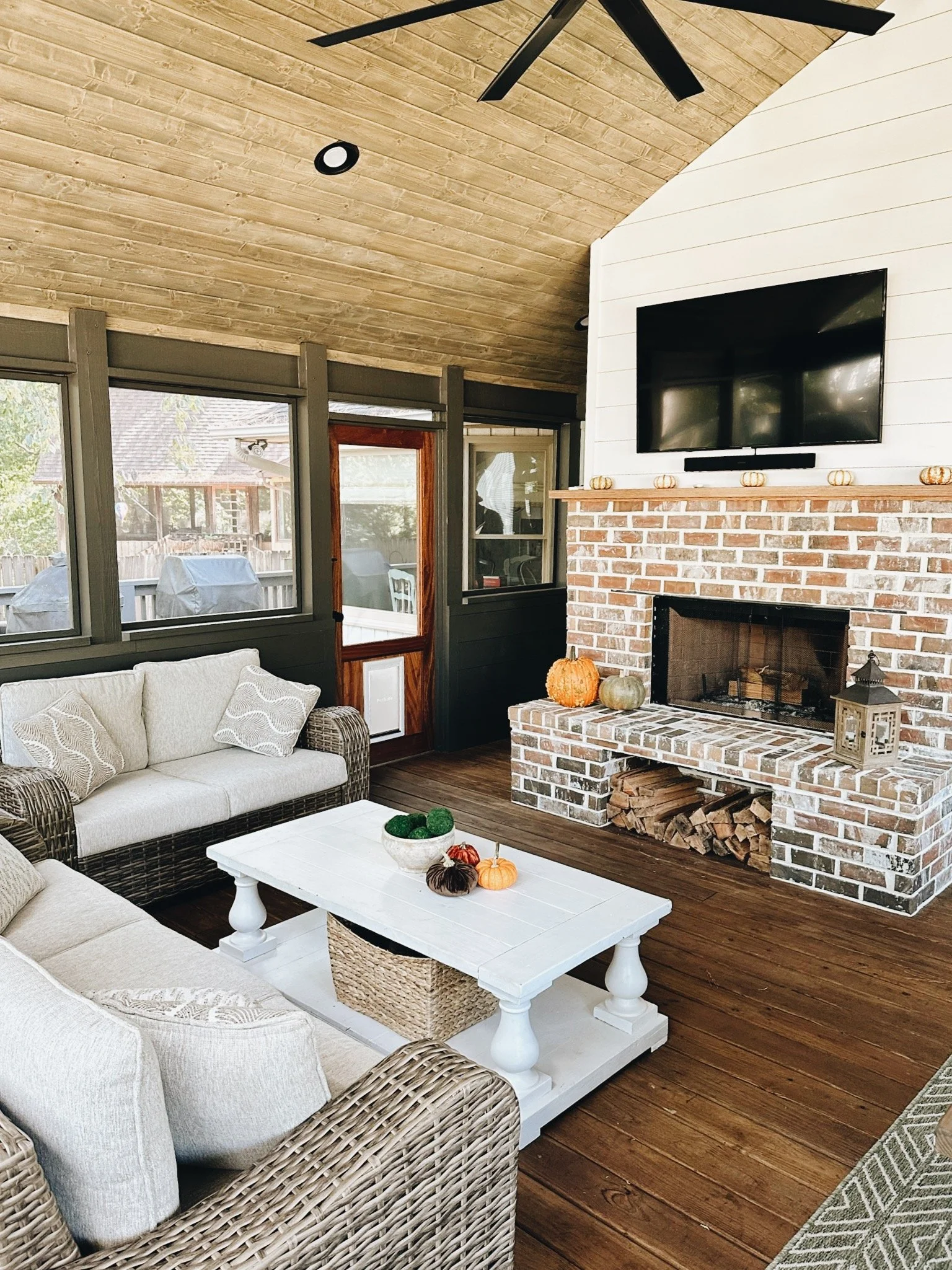 Screened porch addition Birmingham AL — roofline tied into existing home with outdoor living space by Canebrake Construction