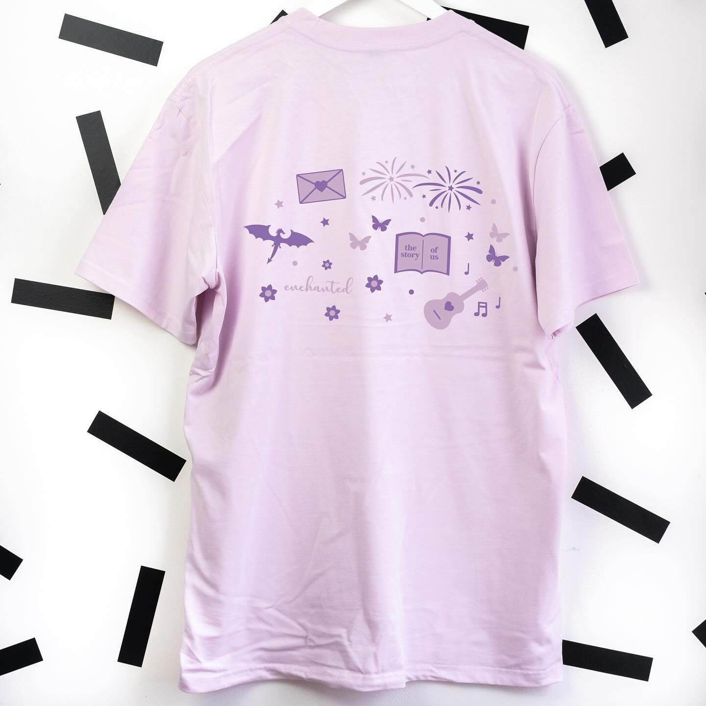 Long live all the magic we made! ✨

Introducing the third tee in our TS collection our &ldquo;Speak Now&rdquo; lilac t-shirt - featuring embroidered text and iconic song illustrations on the back. Only true Swifties will unravel the hidden messages i