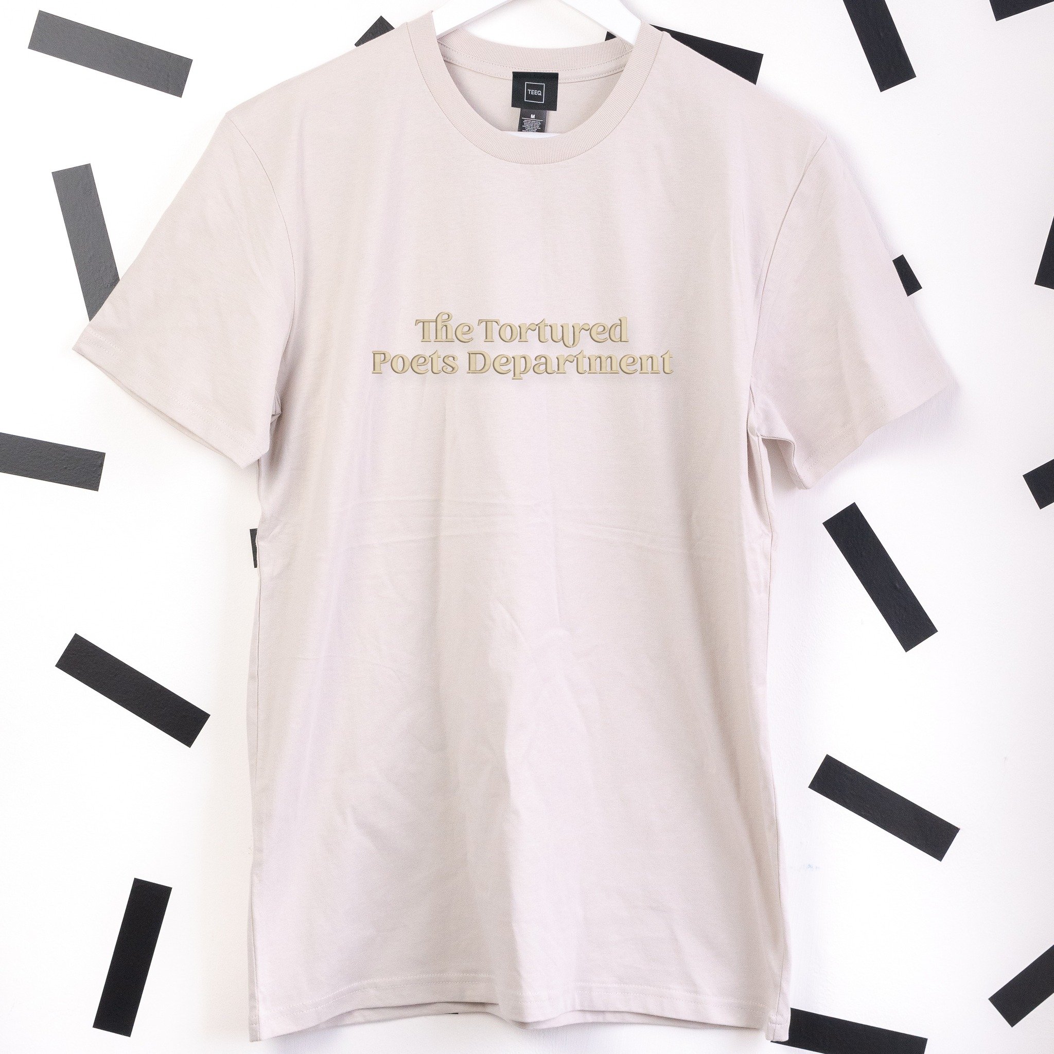 I love you, it's ruining my life... 🎶💔

Step into the emotive world of Taylor Swift with our new Tortured Poets Department album inspired tee! Featuring classic songs and poignant lyrics, this bone coloured tee is a must-have to complete your Swift
