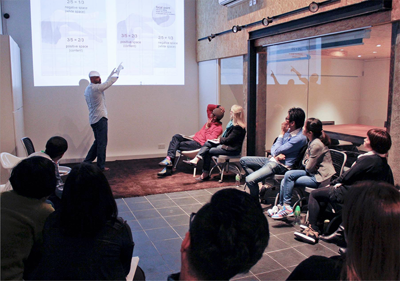 Josh Sellers teaching a design course to senior brand managers at Proctor & Gamble.
