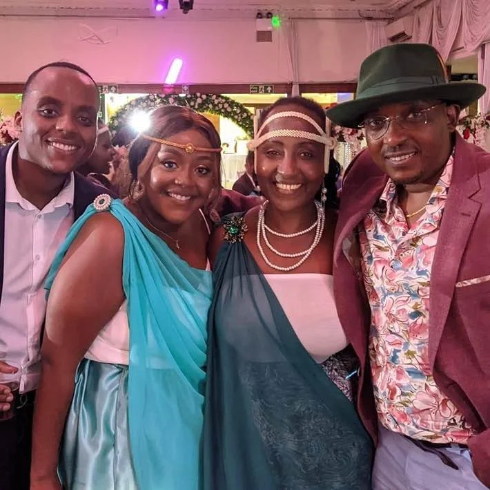  Godefroid with his son Robert, daughter Lise, wife Lydia at a family wedding, North London, 2018 