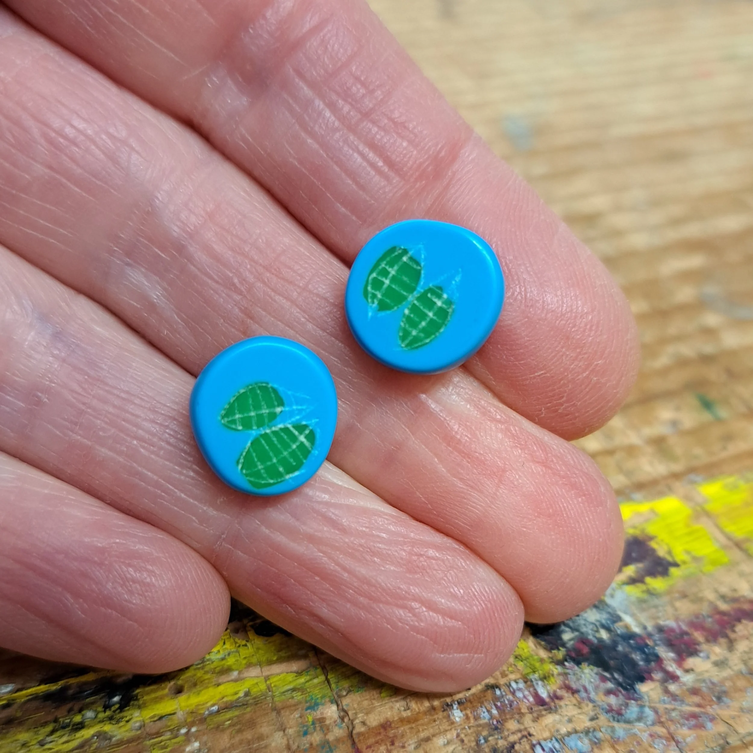 light blue and green mini round studs