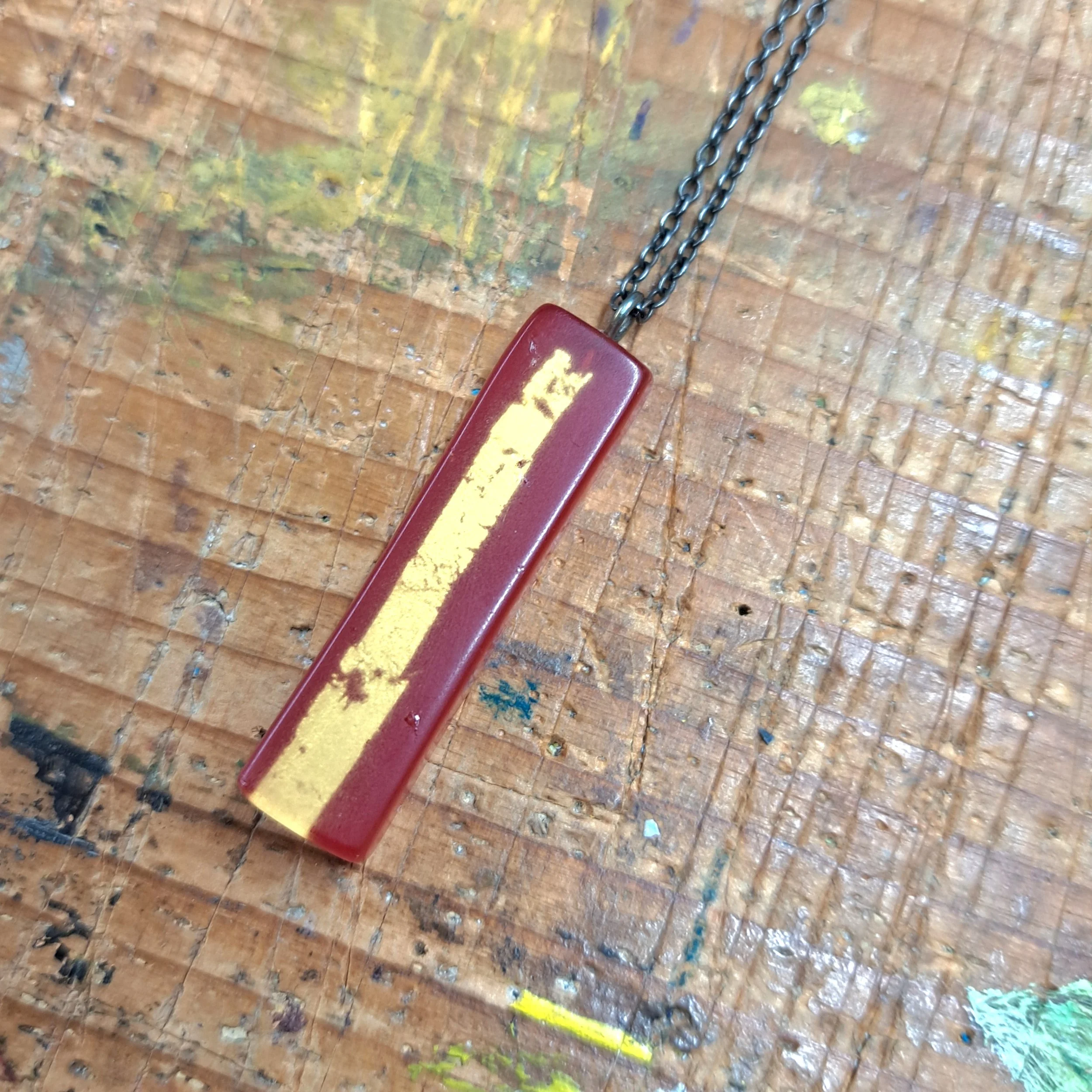 red and gold leaf long pendant