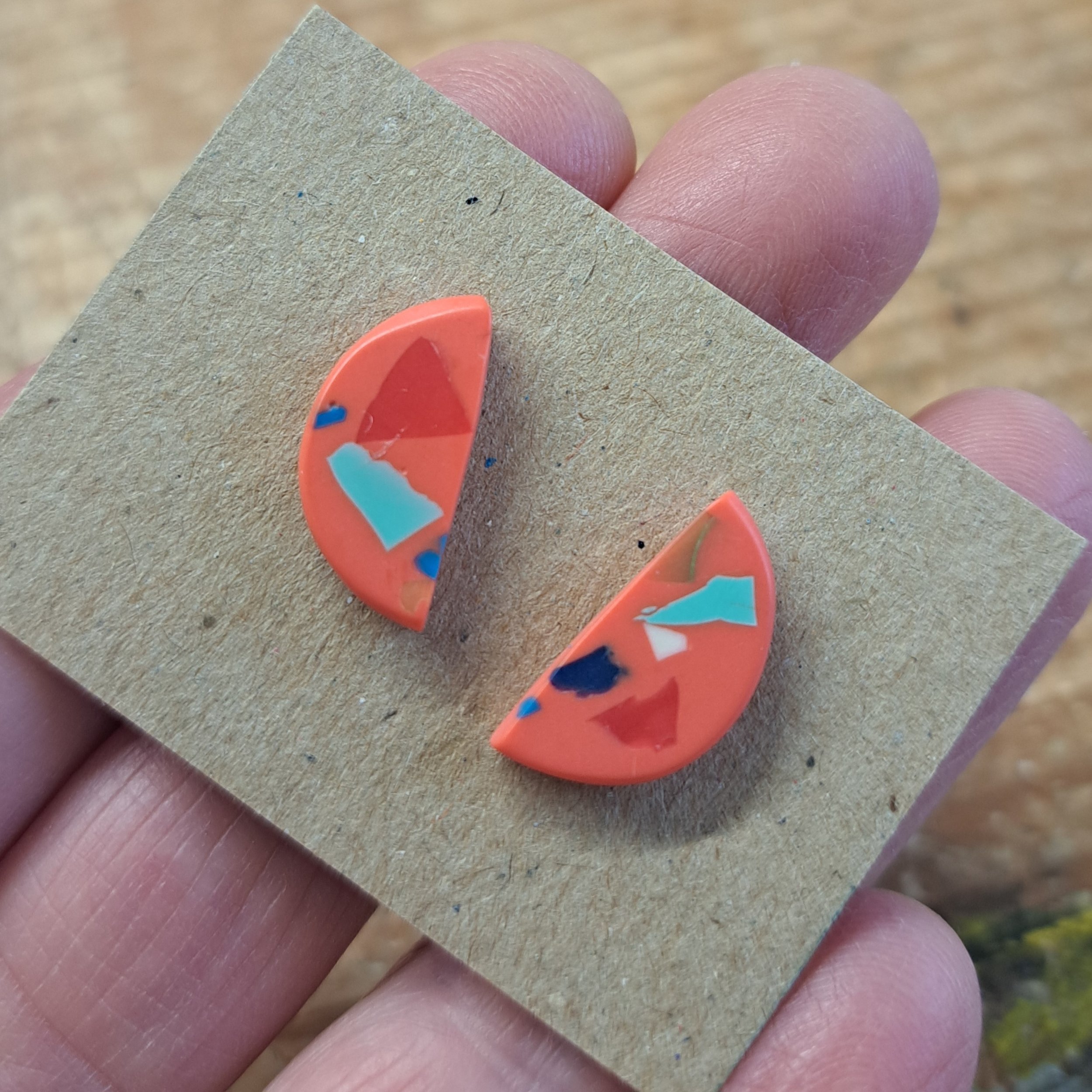 small coral demi studs