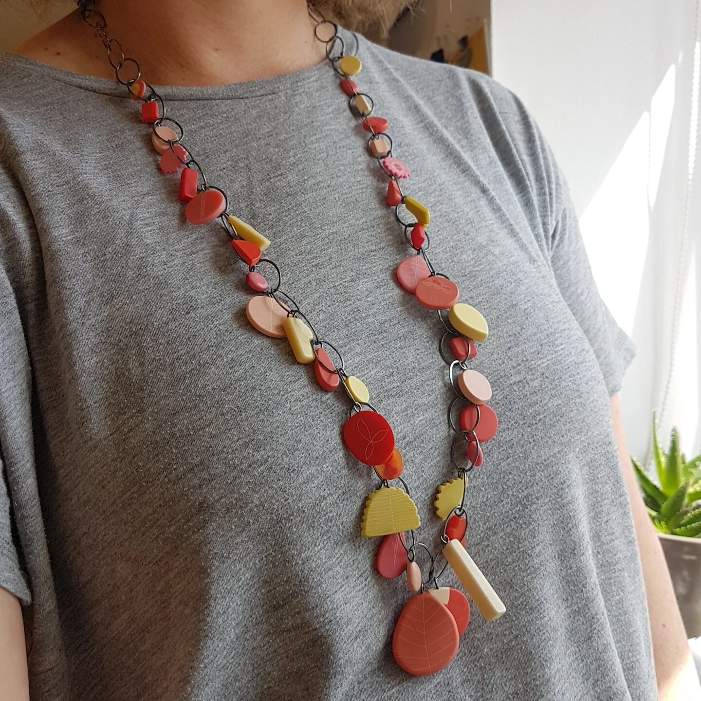 necklace multi charm pinks model.jpg