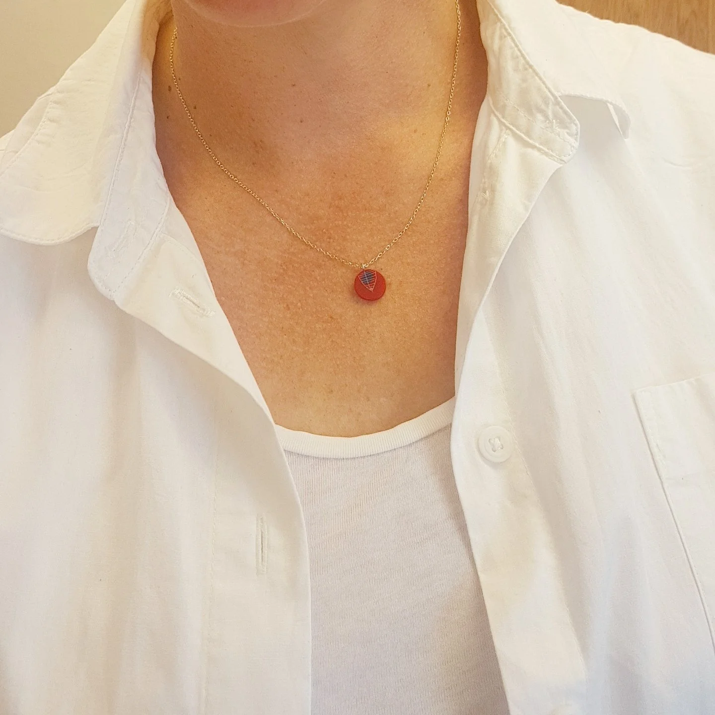 necklace mini round red dk blue model.jpg