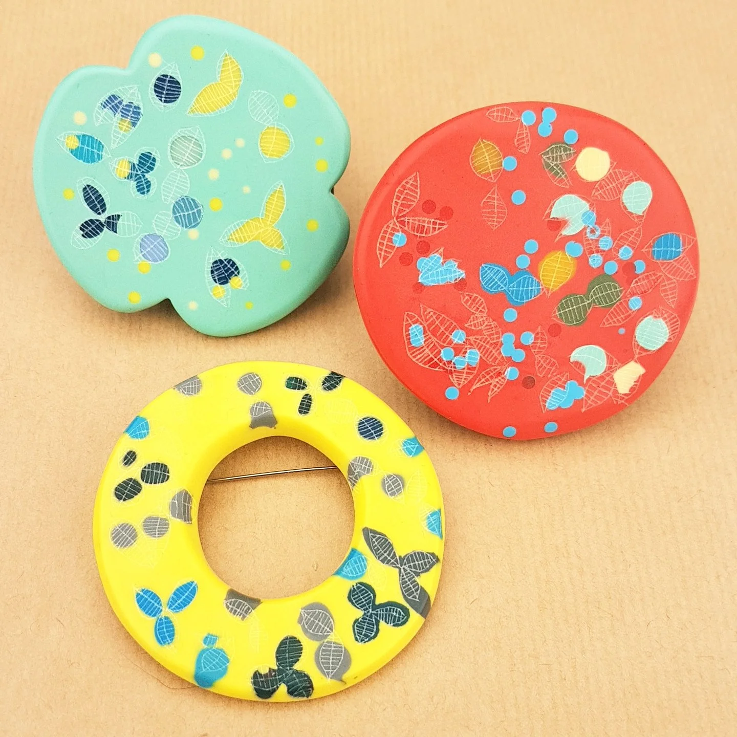3 brooches.jpg