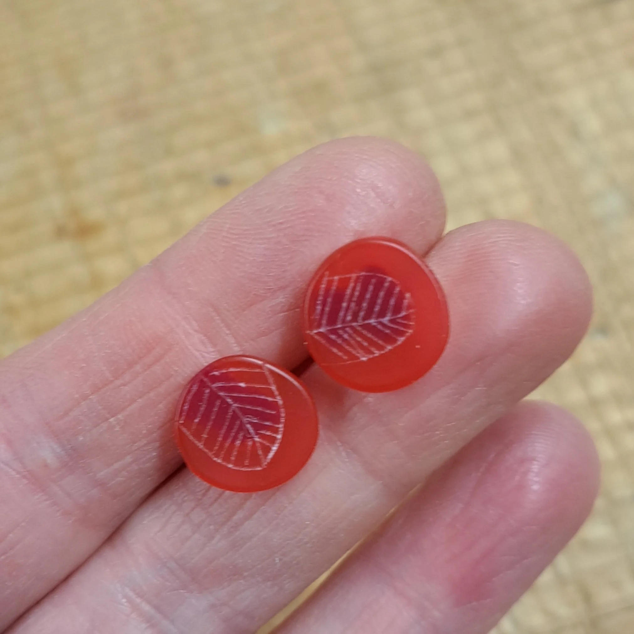 mini round studs translucent red