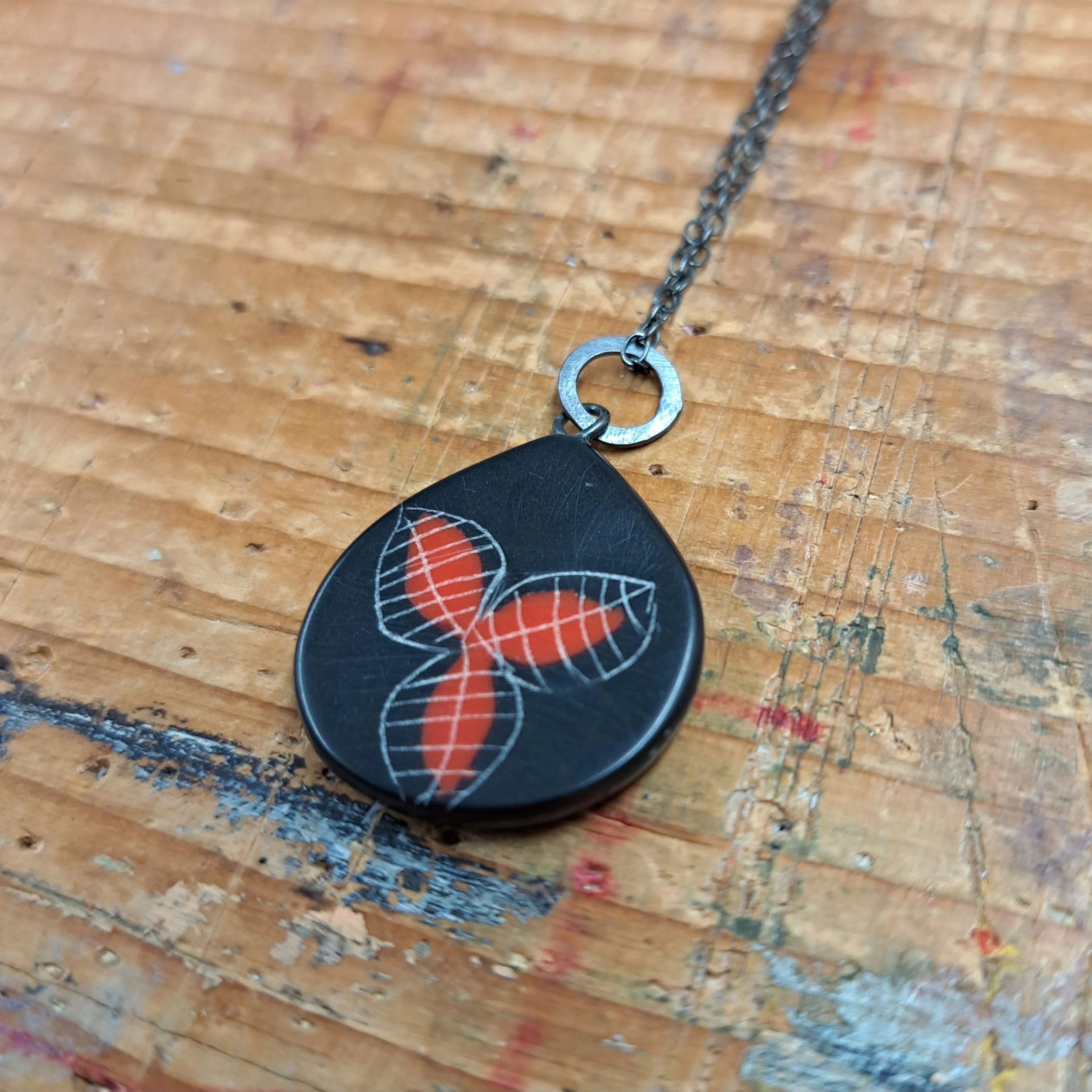 black and red petal pendant