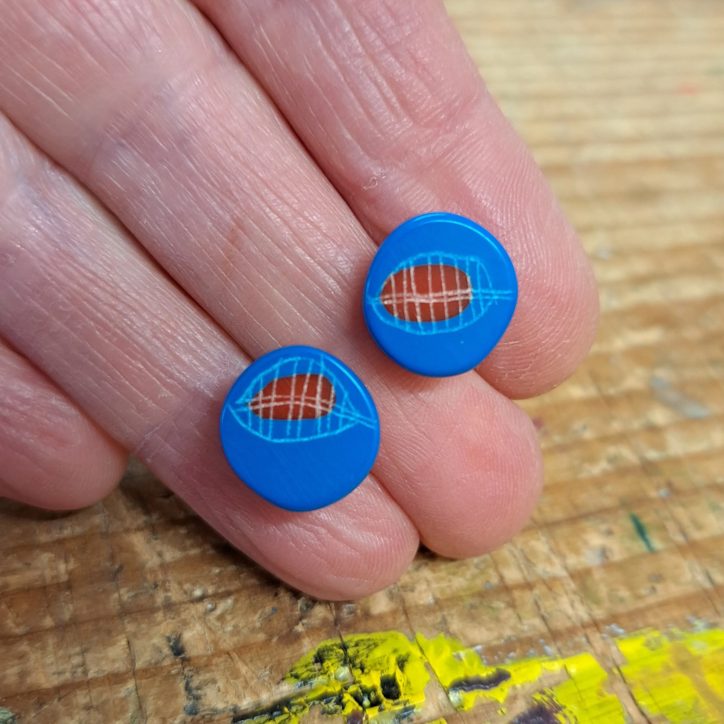blue and red mini round studs