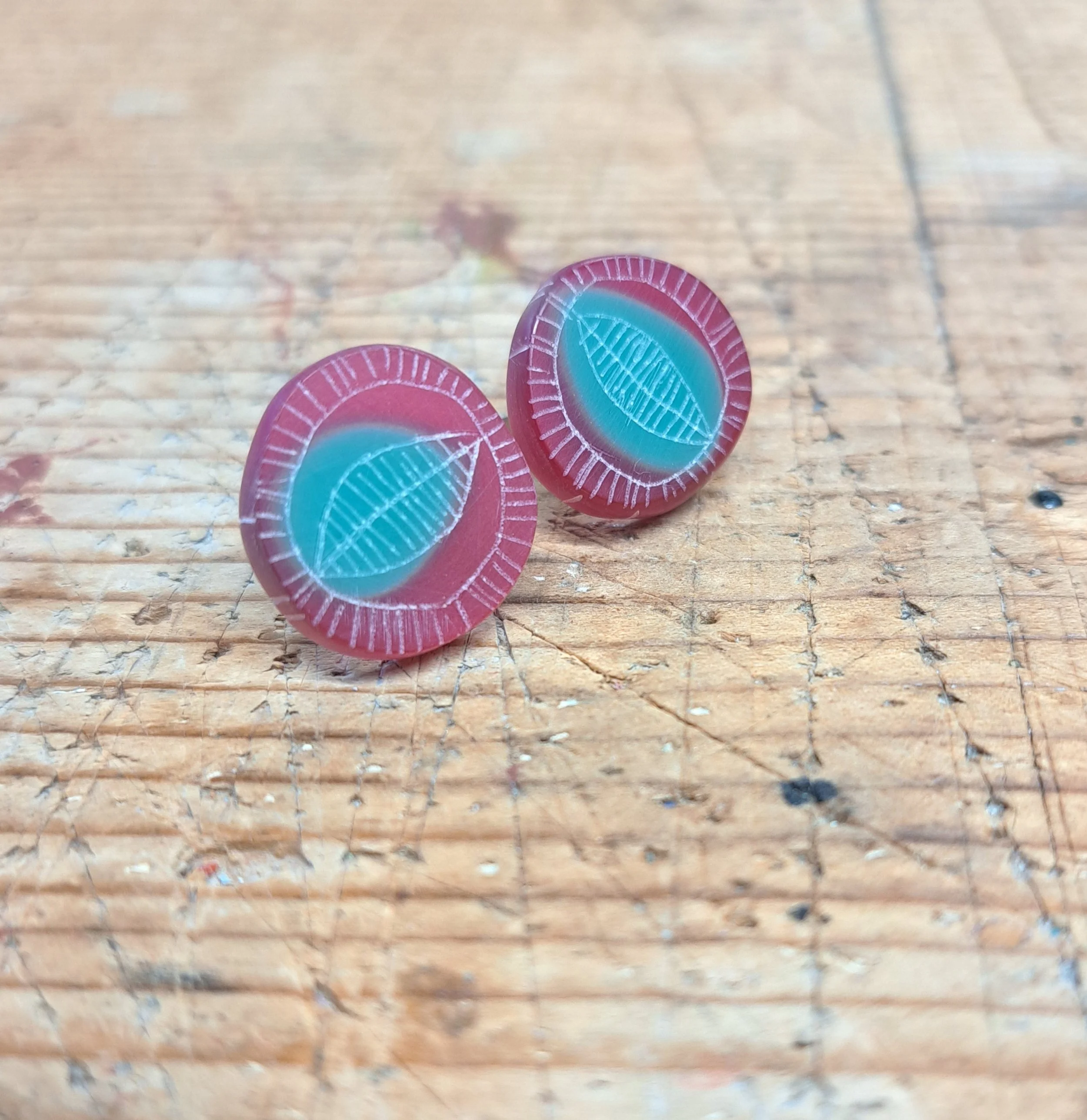 pink and turquoise round studs
