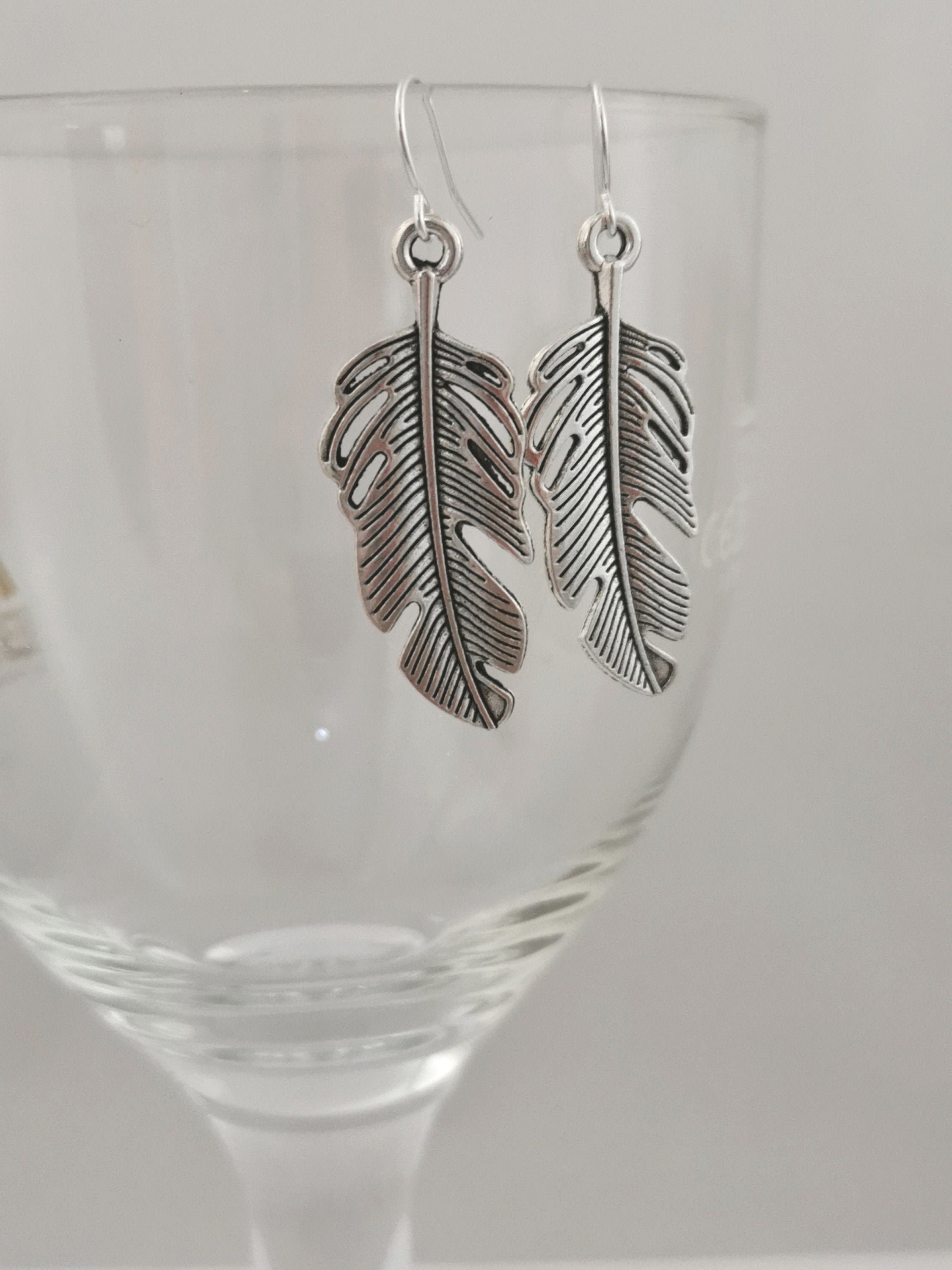 Silver colour feather earrings. Silver plated, nickel free hypoallergenic