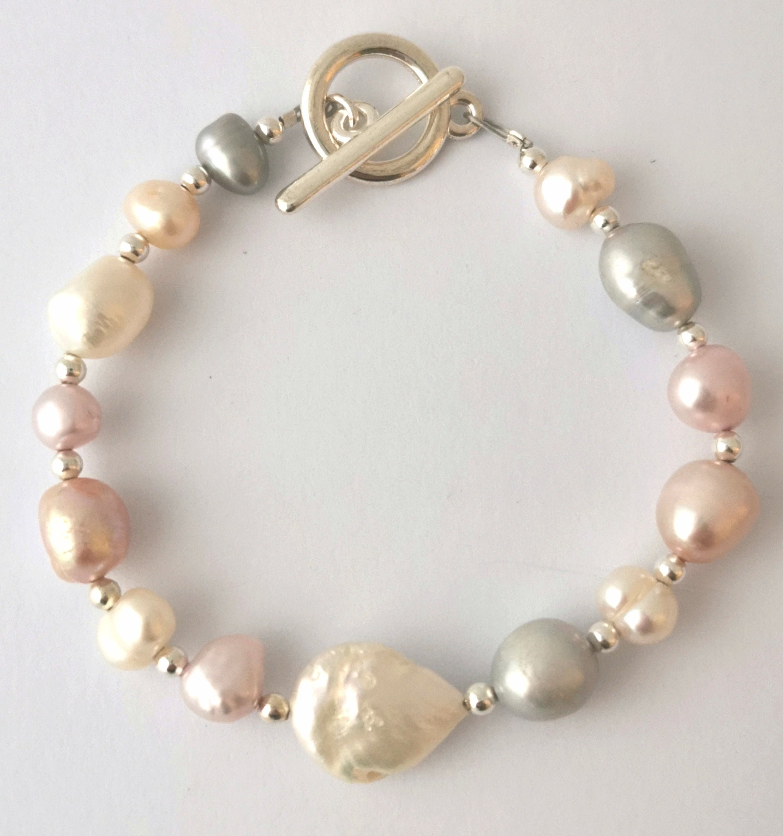 Freshwater pearl bracelet, natural pinks, whites and greys