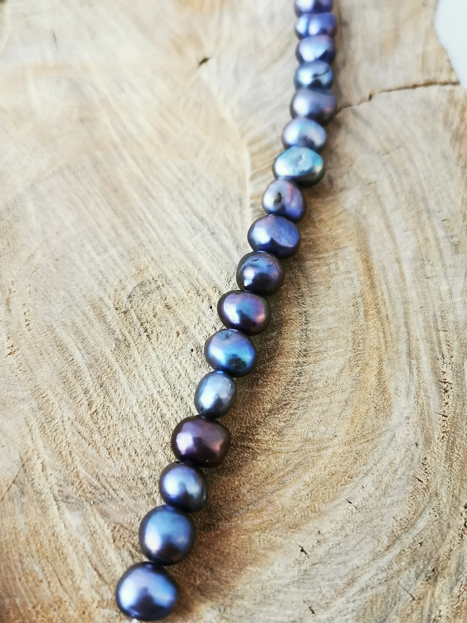 Peacock black freshwater pearl necklace with toggle clasp and