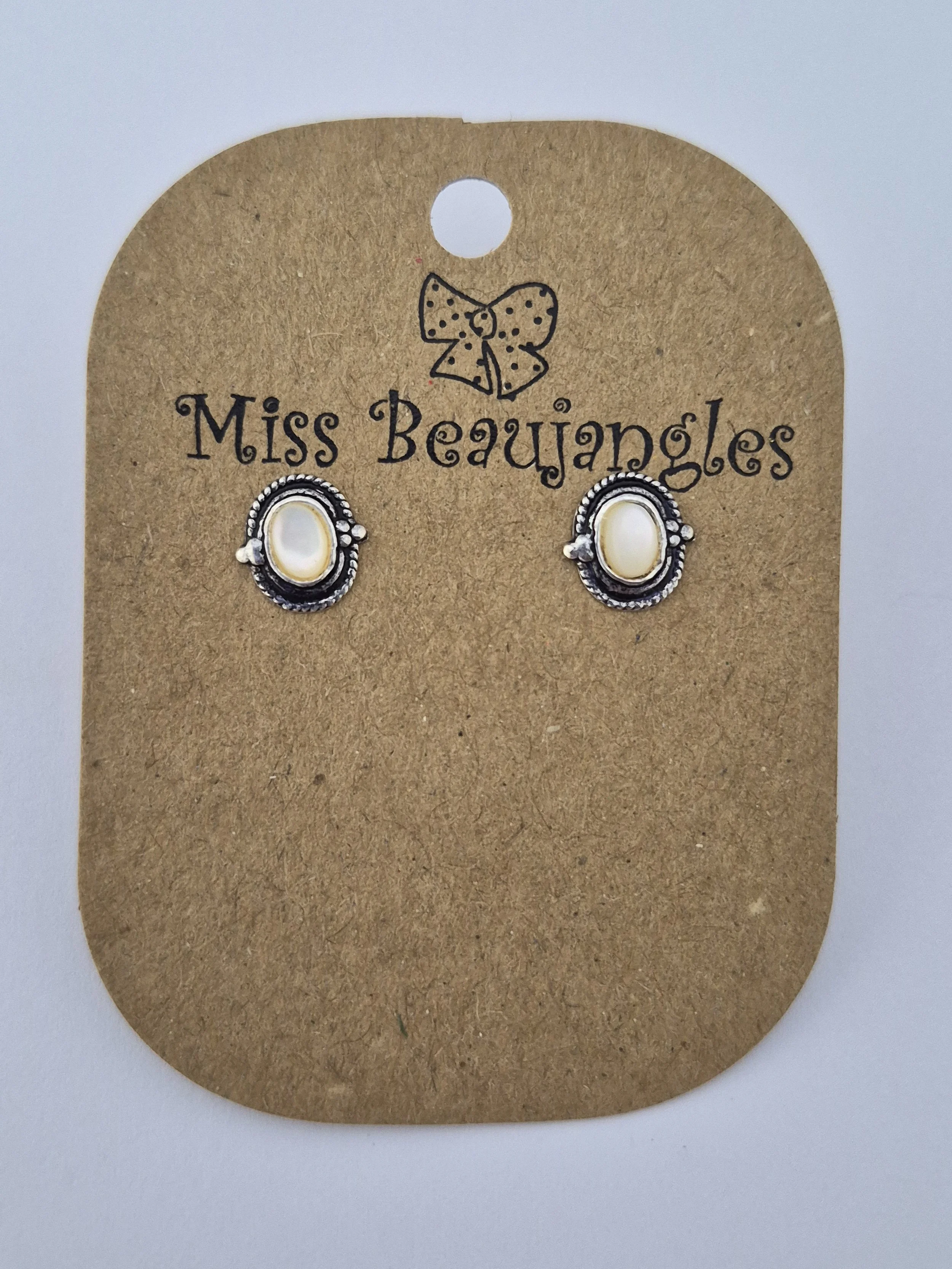 Mother of pearl and oxidised silver studs