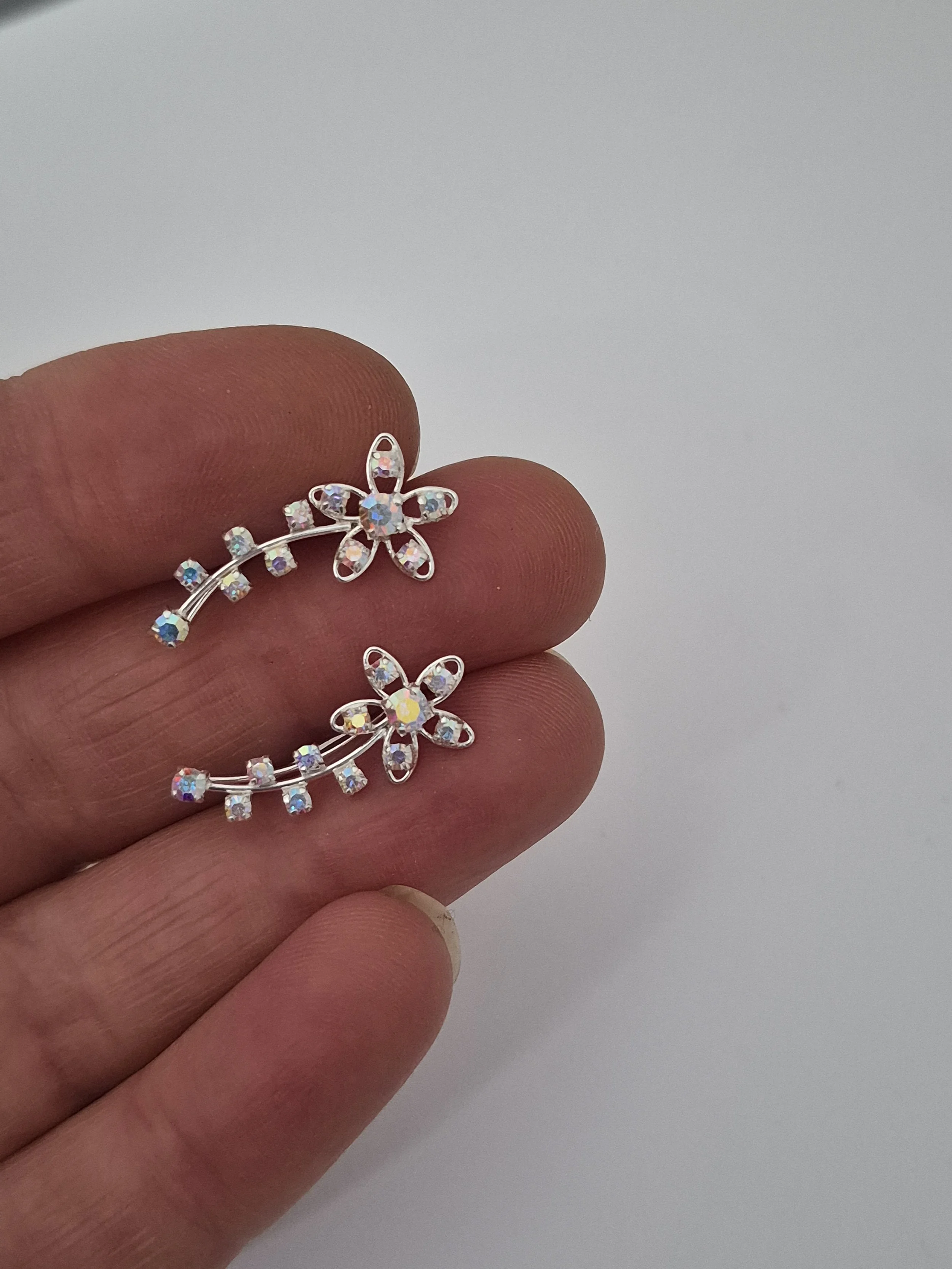 Sterling silver and cubic zirconia flower ear crawlers