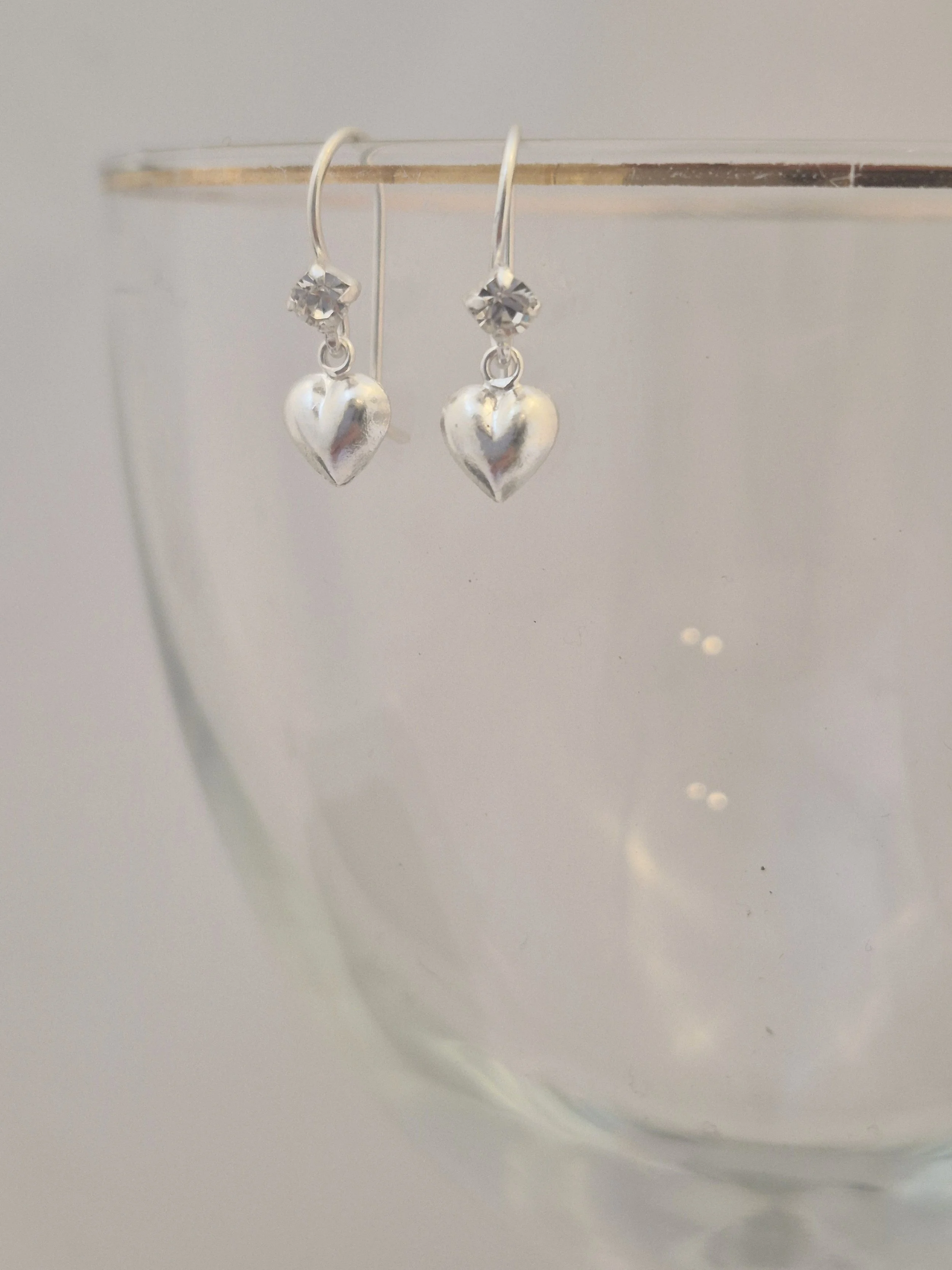 Small sterling silver heart earrings with cubic zirconia detail