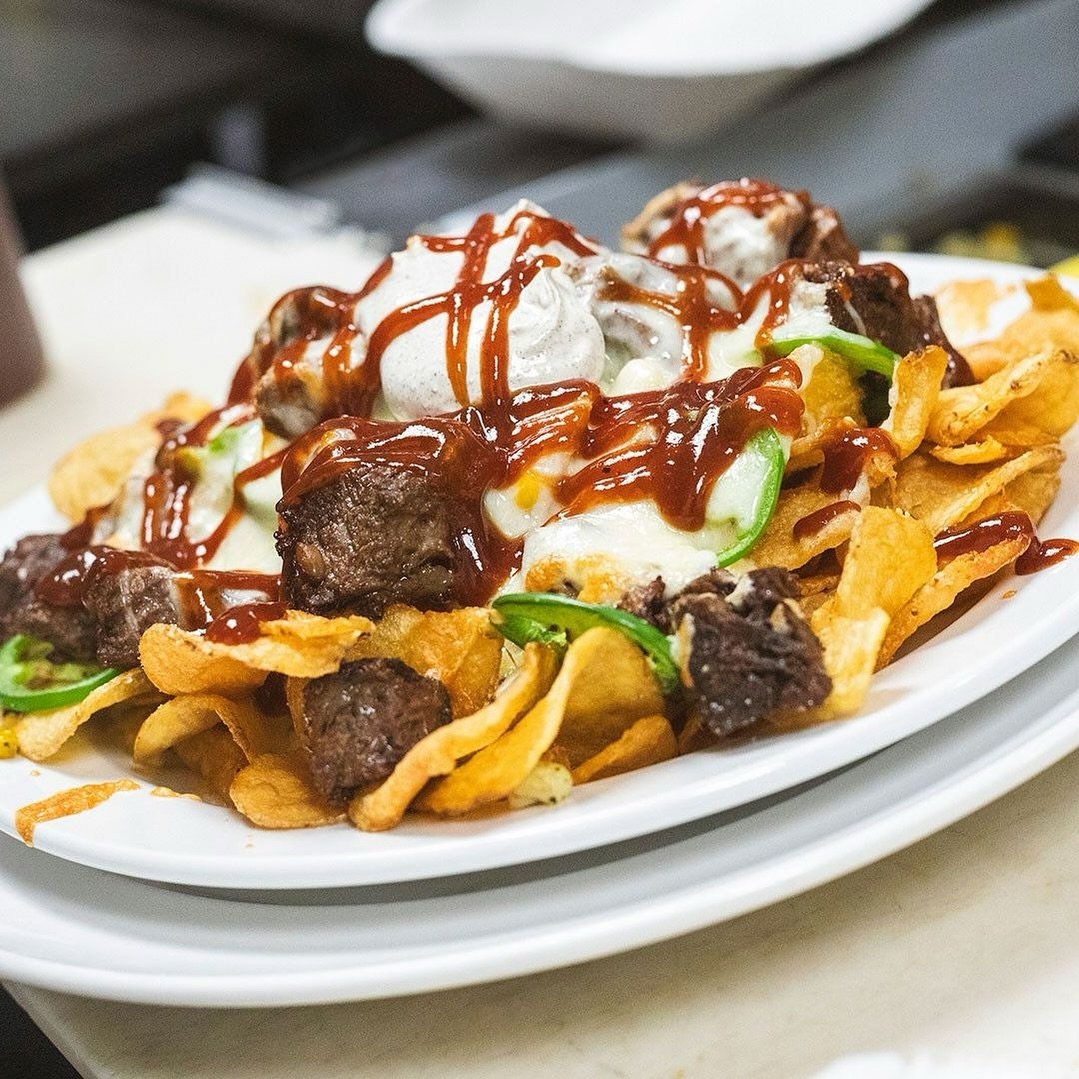 Our Short Rib Potato Chip Nachos are in a class of their own 😮