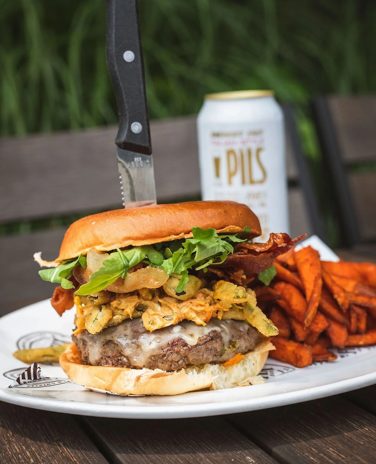 The Diablo Crunch Burger 👹 7oz. house patty, pepperjack cheese, bacon, arugula, crispy jalape&ntilde;o strips, roasted poblano chipotle coleslaw, brioche⁠
⁠
Marlborough location only for a limited time!