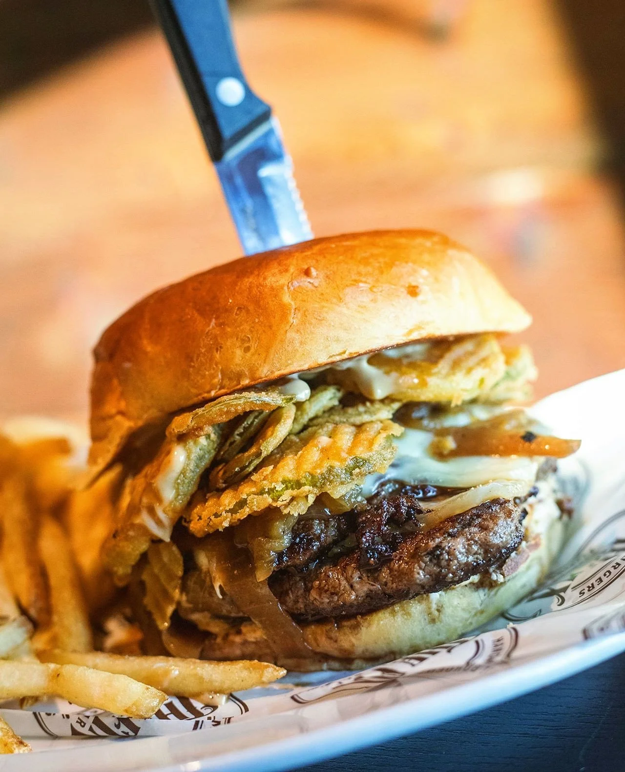There are smash burgers, then there are WAGYU smash burgers loaded up with Swiss, pimento cheese, bacon, fried pickle, fried jalape&ntilde;o, caramelized onion, and A1 aioli on brioche. ⁠
⁠
It's basically the Ferrari of smash burgers and it's availab