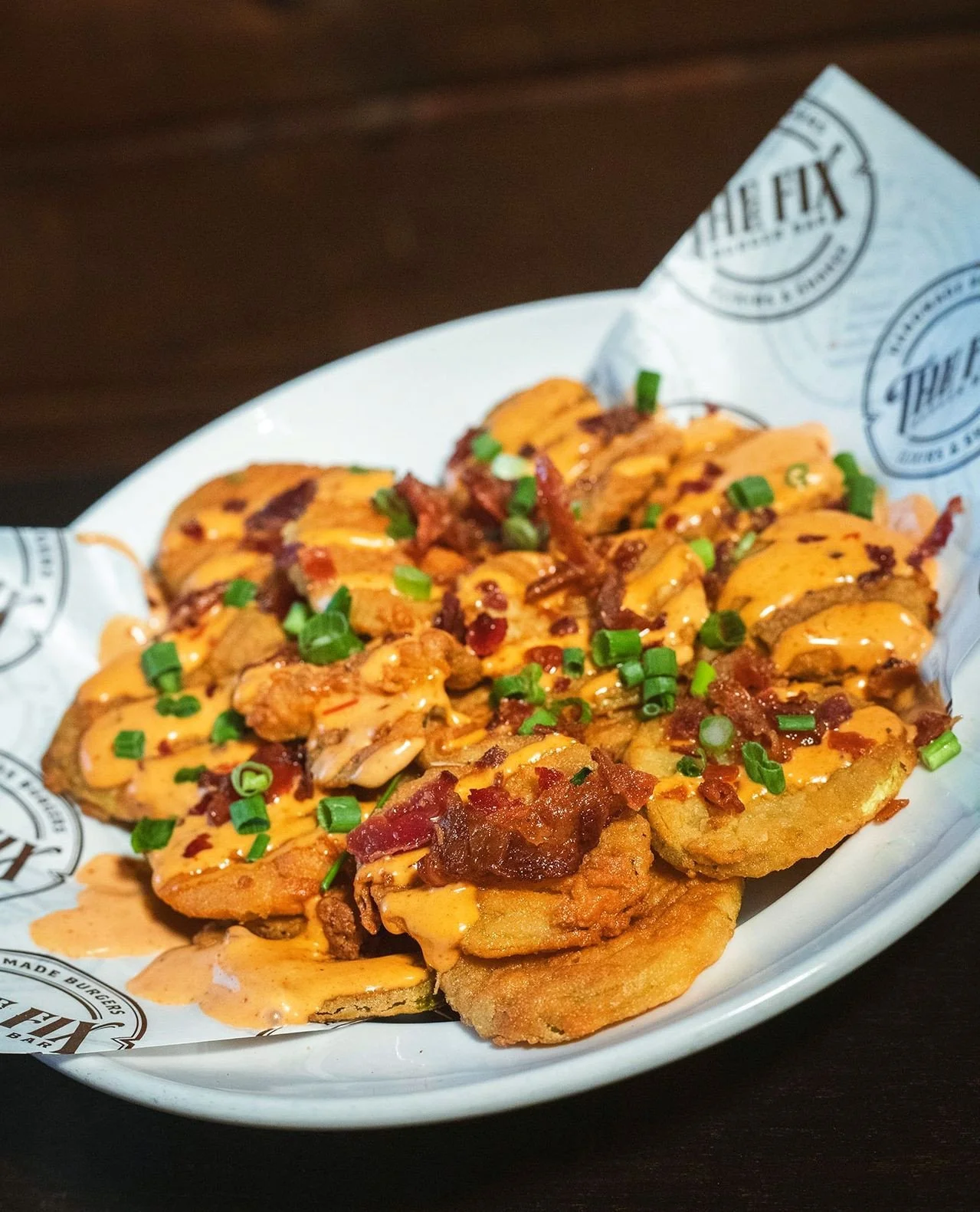 The Evil Twin 👹Habanero and jalape&ntilde;o fried pickles, chipotle ranch, scallion, bacon⁠
⁠
Worcester location only for a limited time!