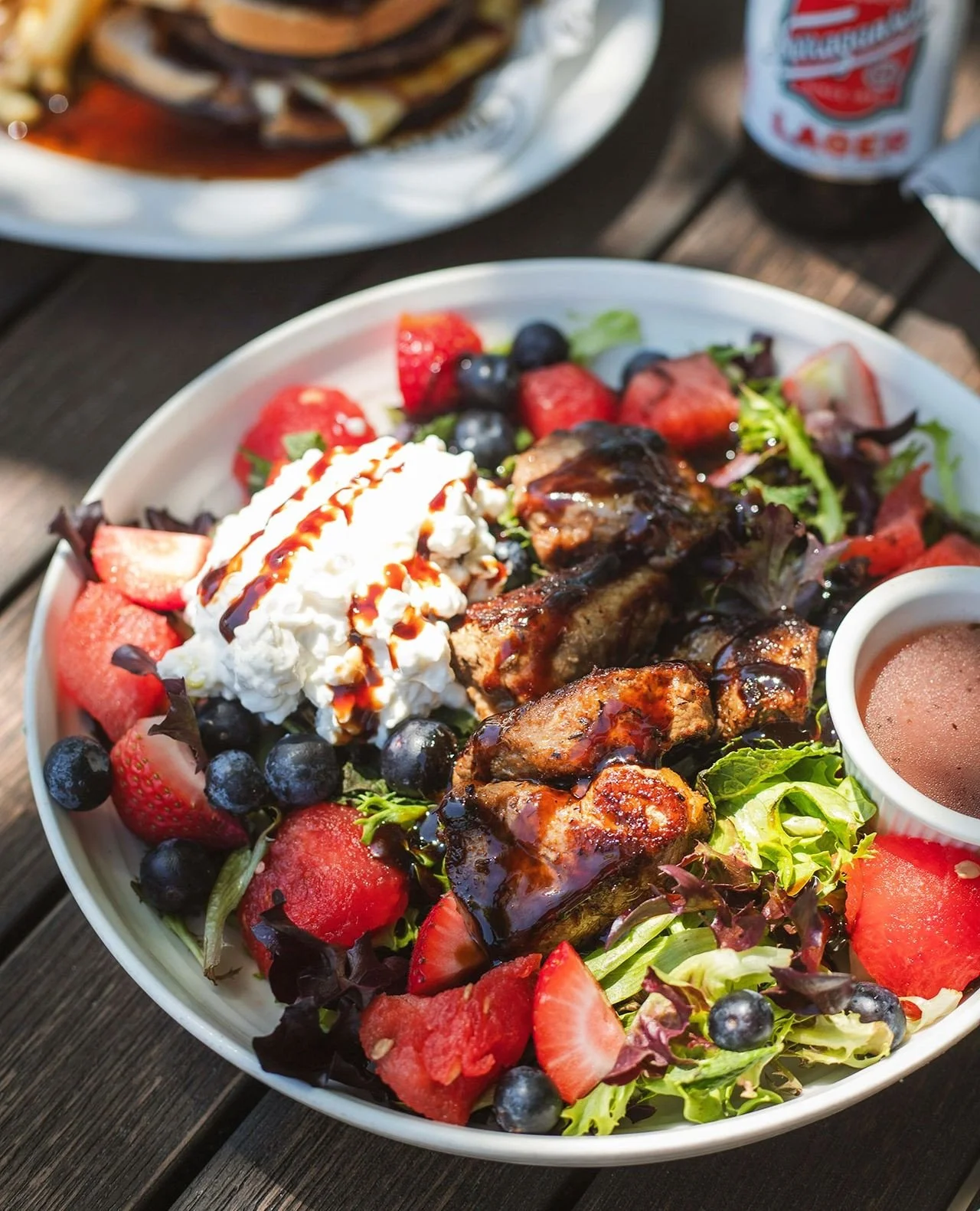 Welp, that settles that. Lunch at The Fix today it is. Great day for the patio too!⁠
⁠
Berry Fresh Bowl &ndash; steak tips, spring mix, mint leaves, watermelon, blueberries, strawberries, and cottage cheese served with a blackberry basil vinaigrette⁠